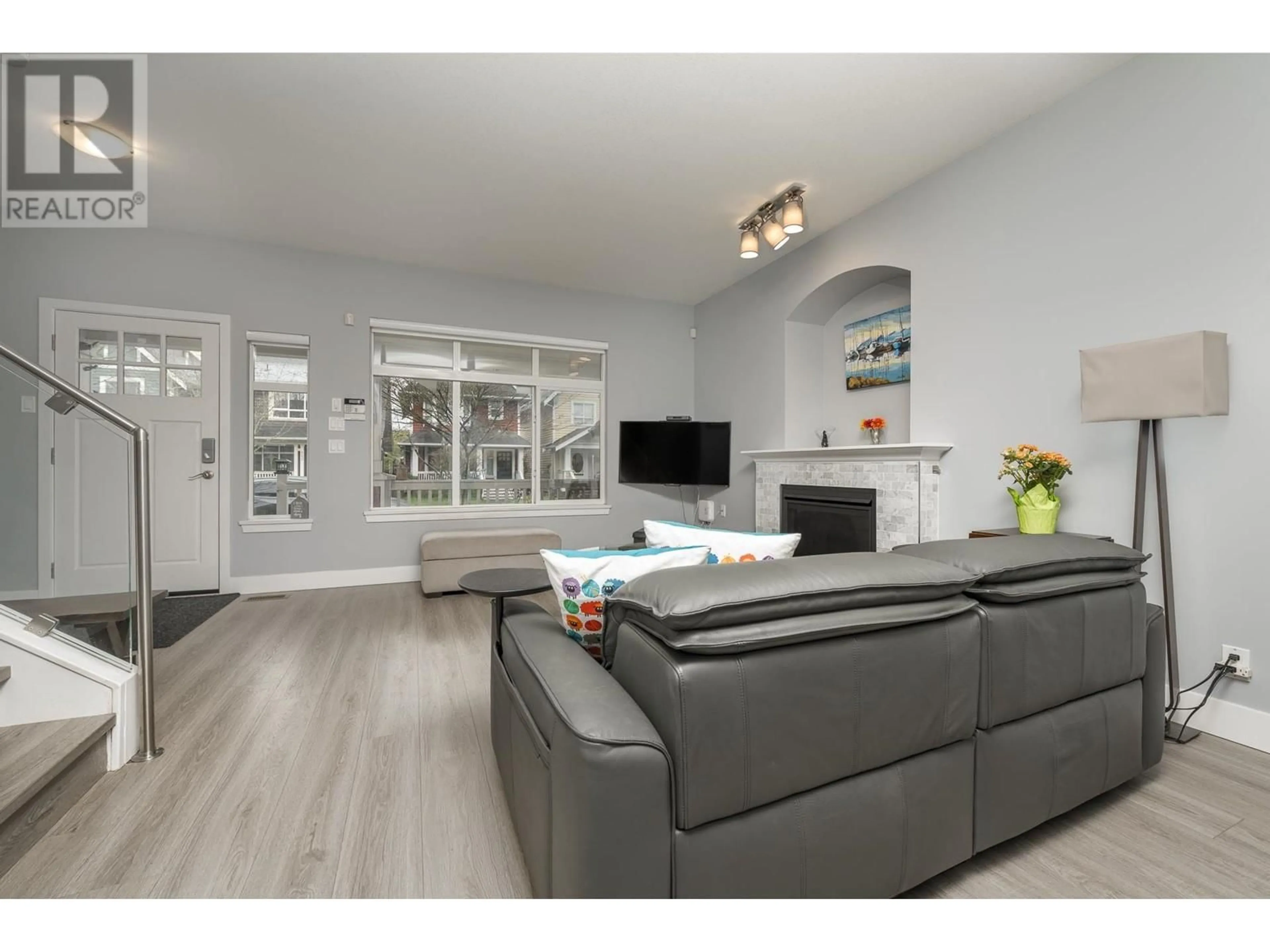 Living room with furniture, wood/laminate floor for 155 DOCKSIDE COURT, New Westminster British Columbia V3M0B2