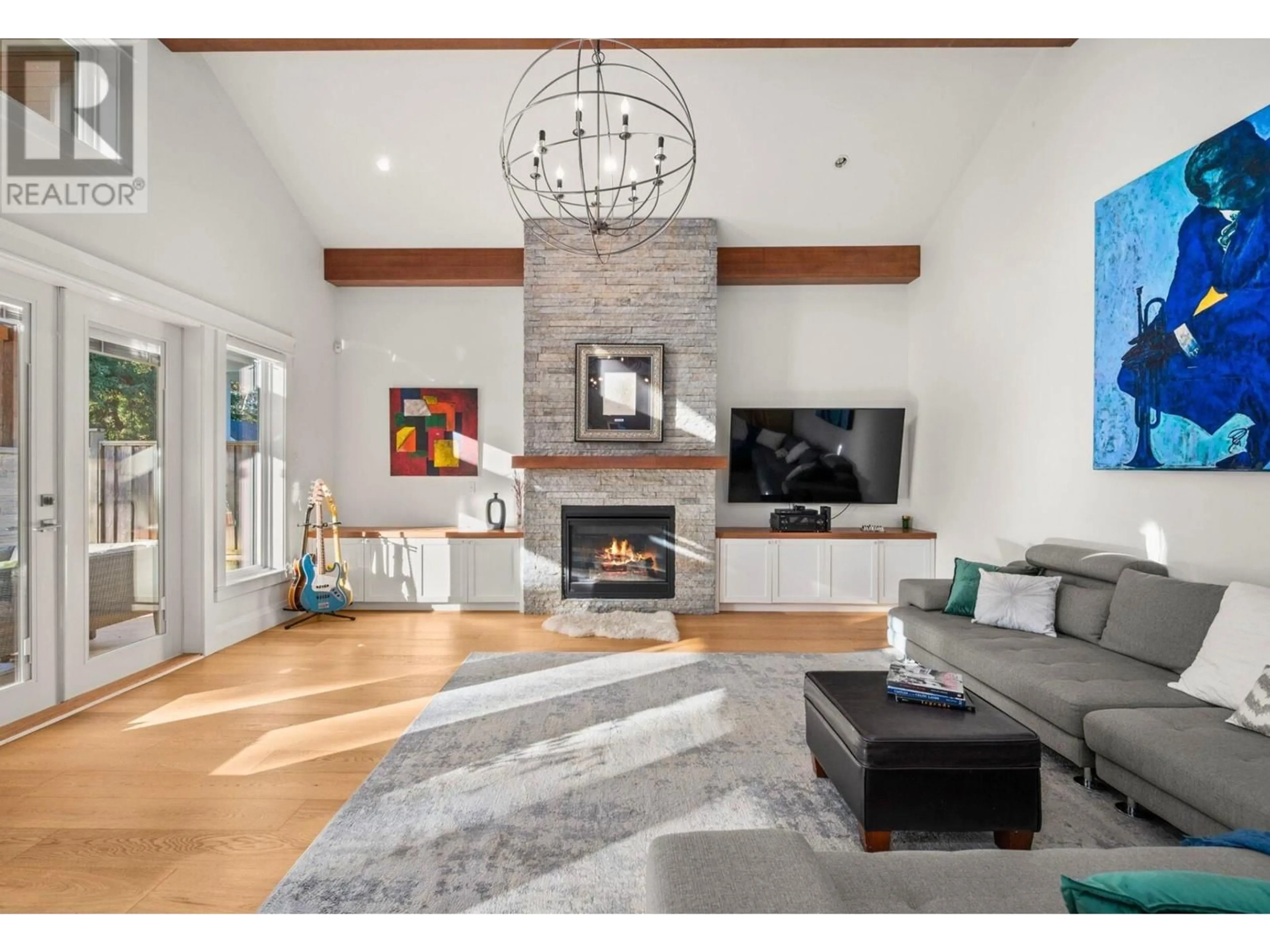 Living room with furniture, wood/laminate floor for 5183 WINSKILL DRIVE, Delta British Columbia V4M2C9