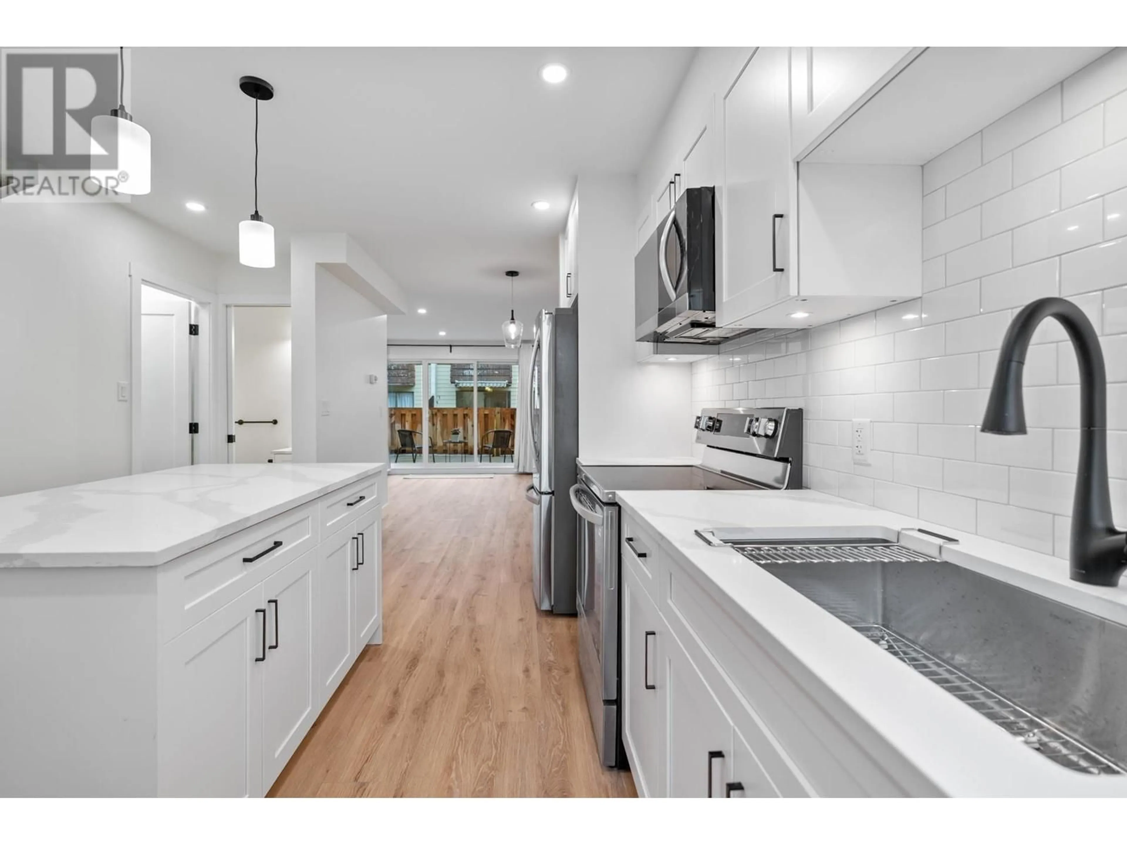 Open concept kitchen, unknown for 7423 13TH AVENUE, Burnaby British Columbia V3N2E2