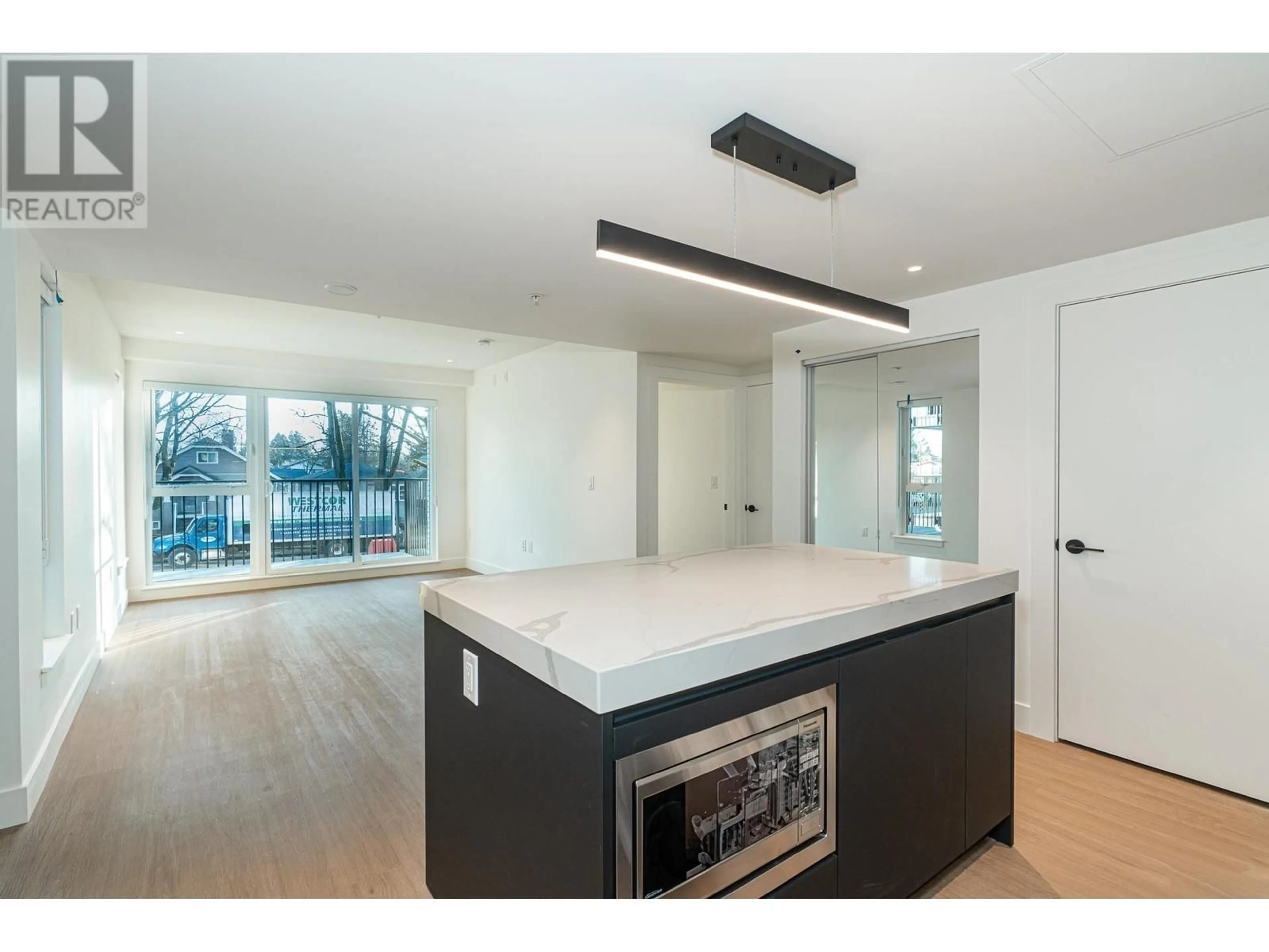 Open concept kitchen, unknown for 205 - 2235 BROADWAY, Vancouver British Columbia V5N0J5