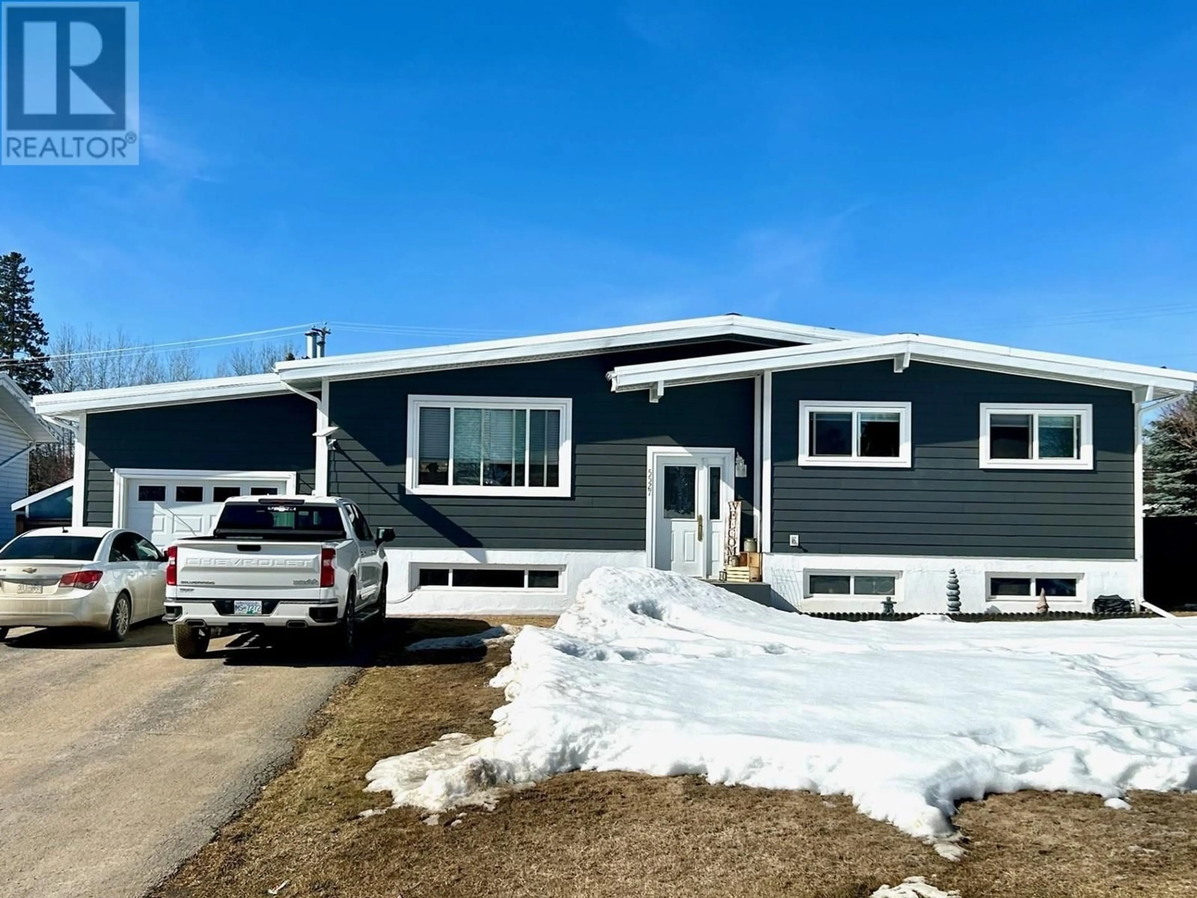 Home with vinyl exterior material, street for 5527 53 STREET, Fort Nelson British Columbia V0C1R0