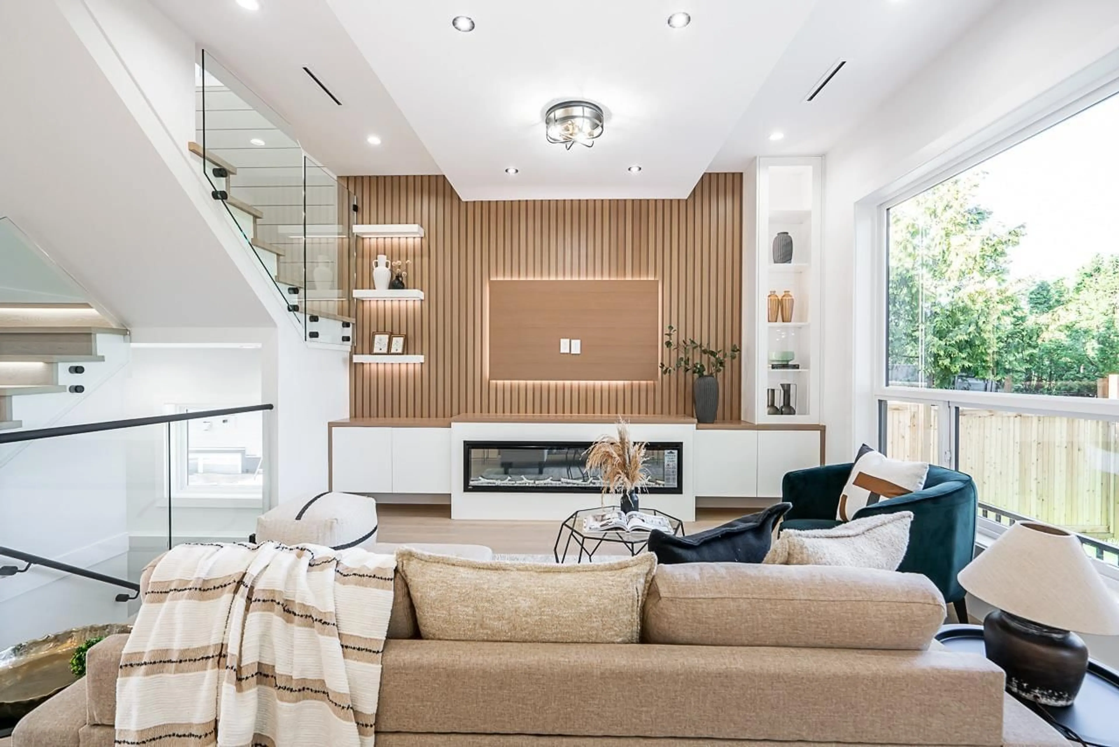 Living room with furniture, wood/laminate floor for 7126 204A, Langley British Columbia V2Y3S7