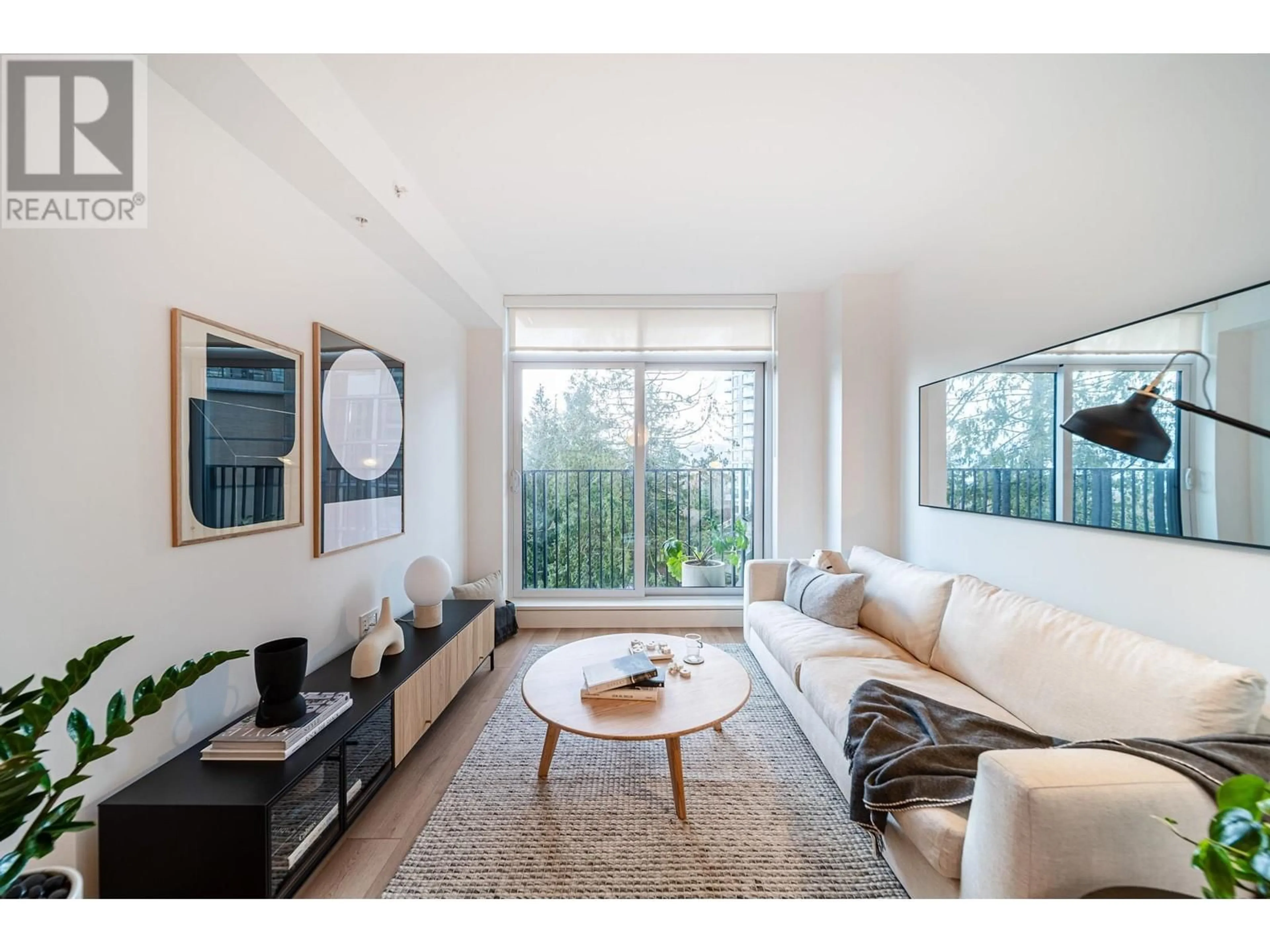 Living room with furniture, unknown for 405 - 8750 UNIVERSITY CRESCENT, Burnaby British Columbia V5A0G9