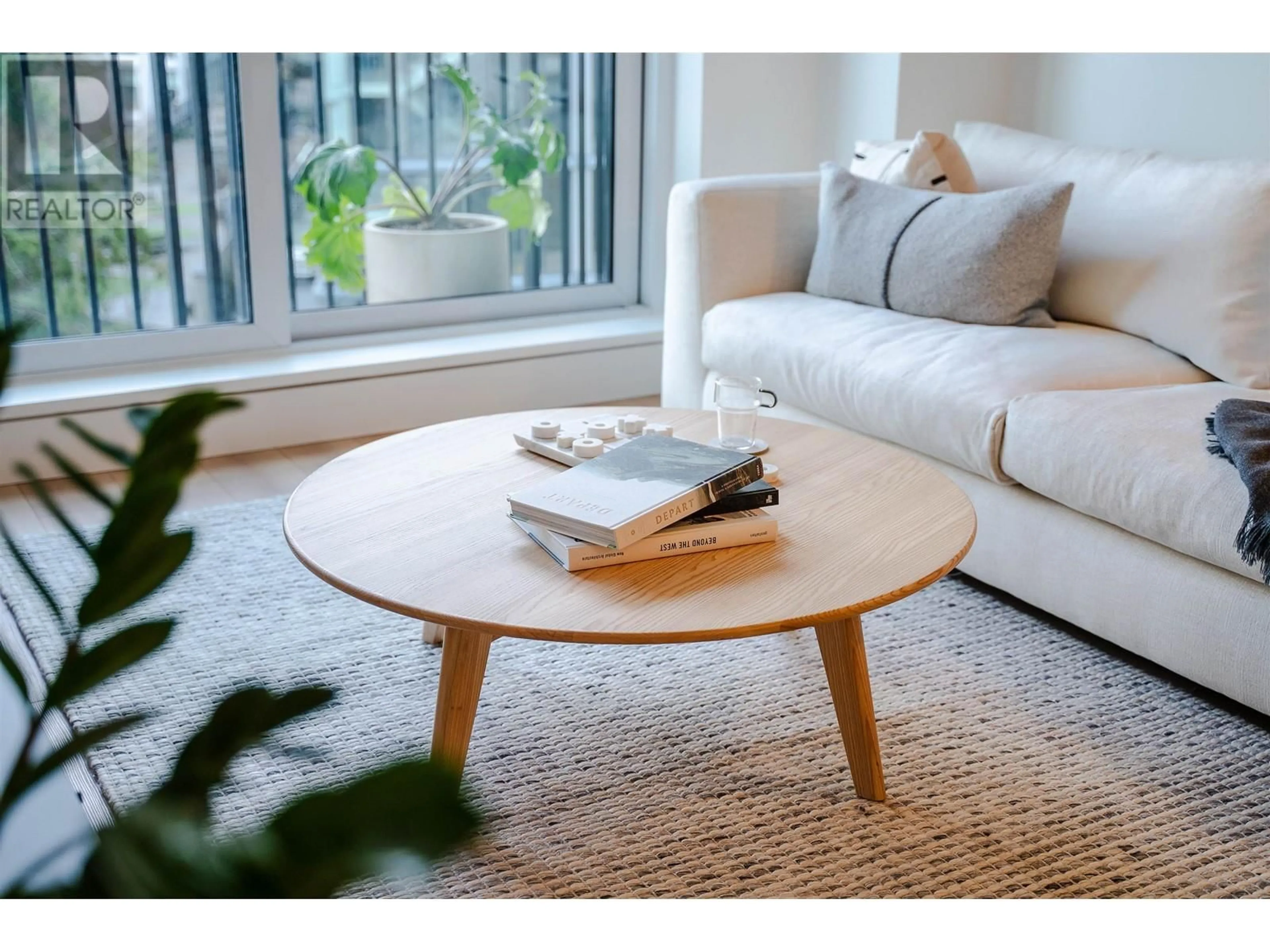 Living room with furniture, unknown for 405 - 8750 UNIVERSITY CRESCENT, Burnaby British Columbia V5A0G9