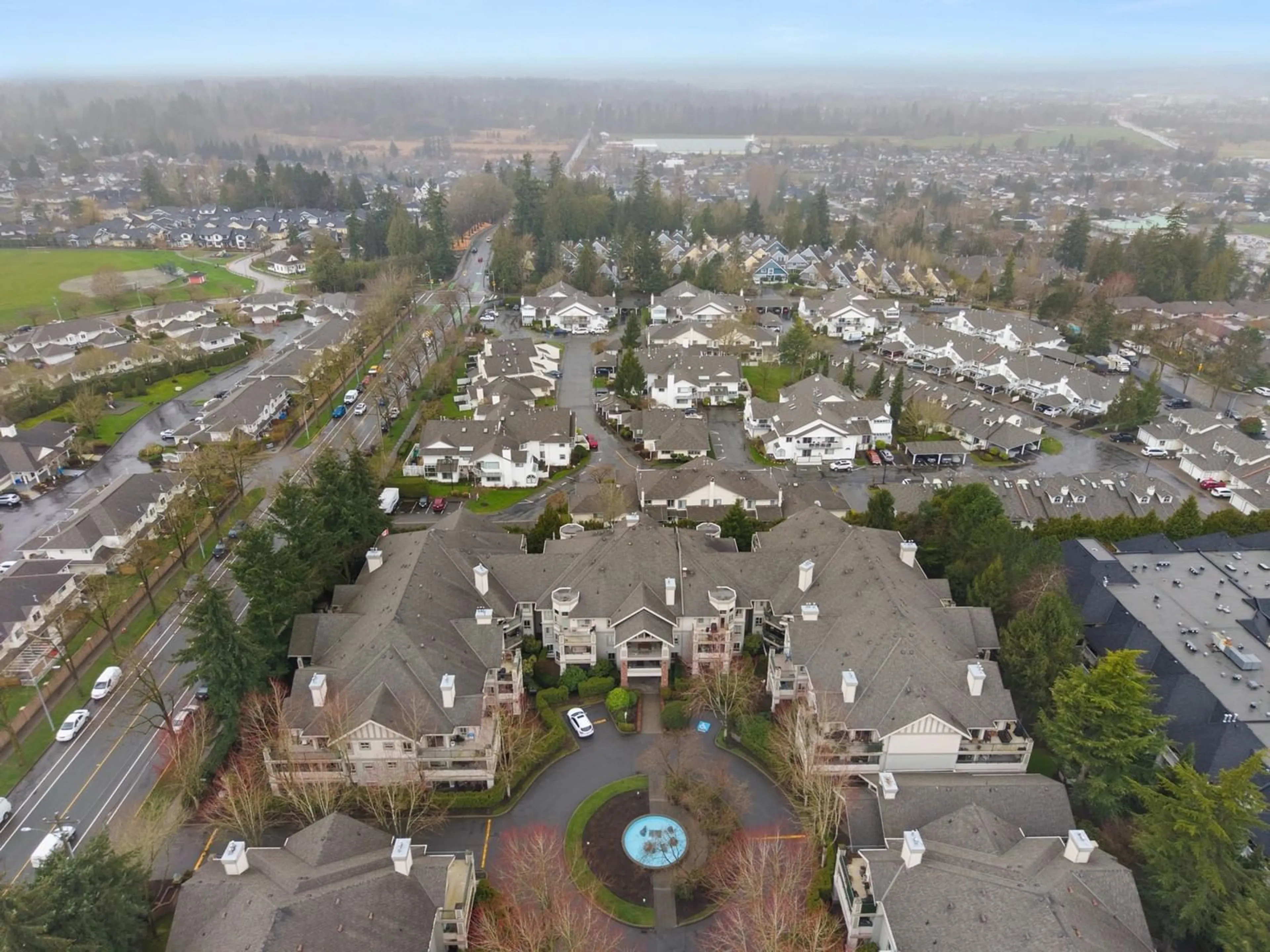 A pic from outside/outdoor area/front of a property/back of a property/a pic from drone, mountain view for 105 - 22015 48, Langley British Columbia V3A8L3