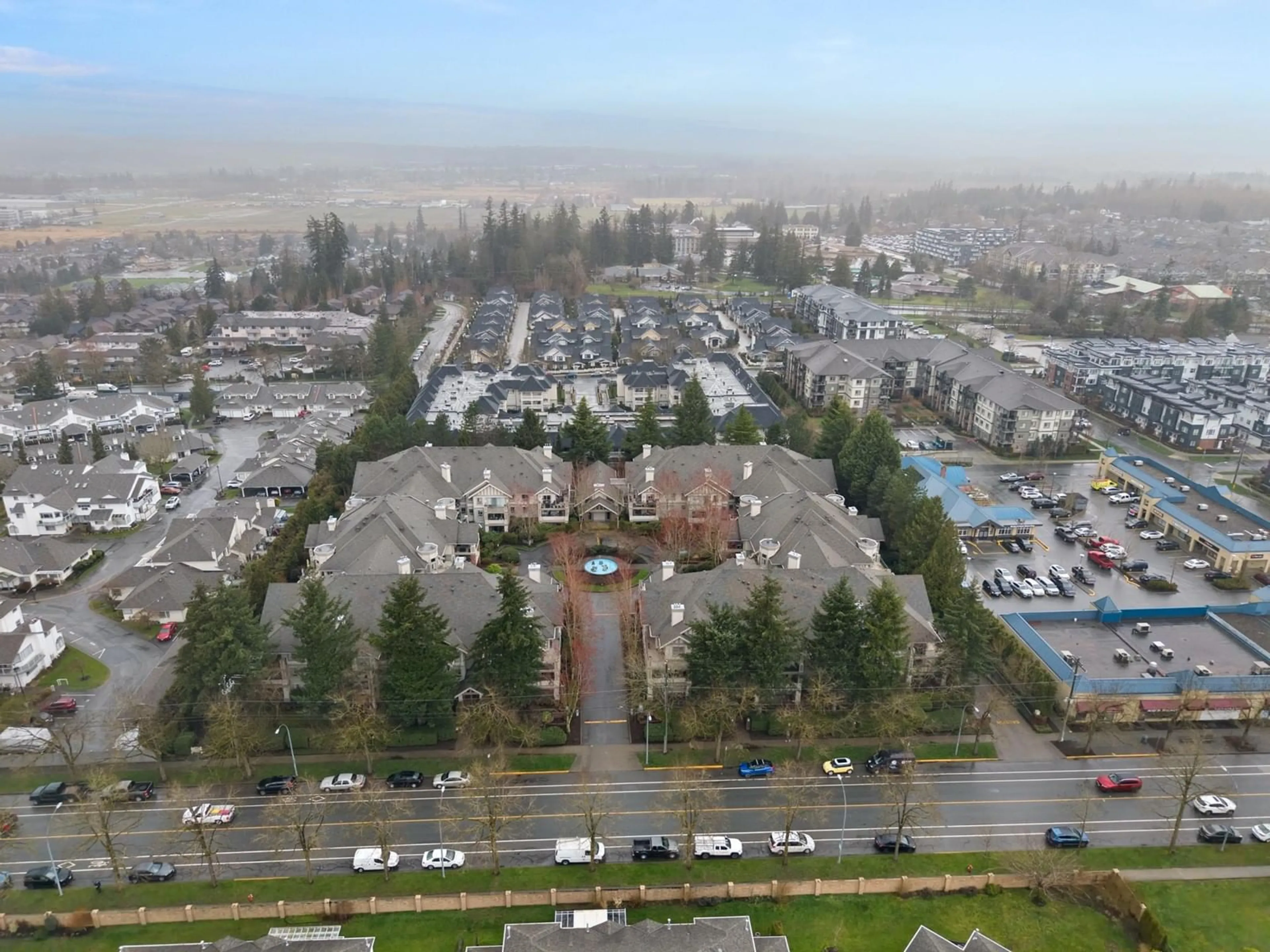 A pic from outside/outdoor area/front of a property/back of a property/a pic from drone, mountain view for 105 - 22015 48, Langley British Columbia V3A8L3
