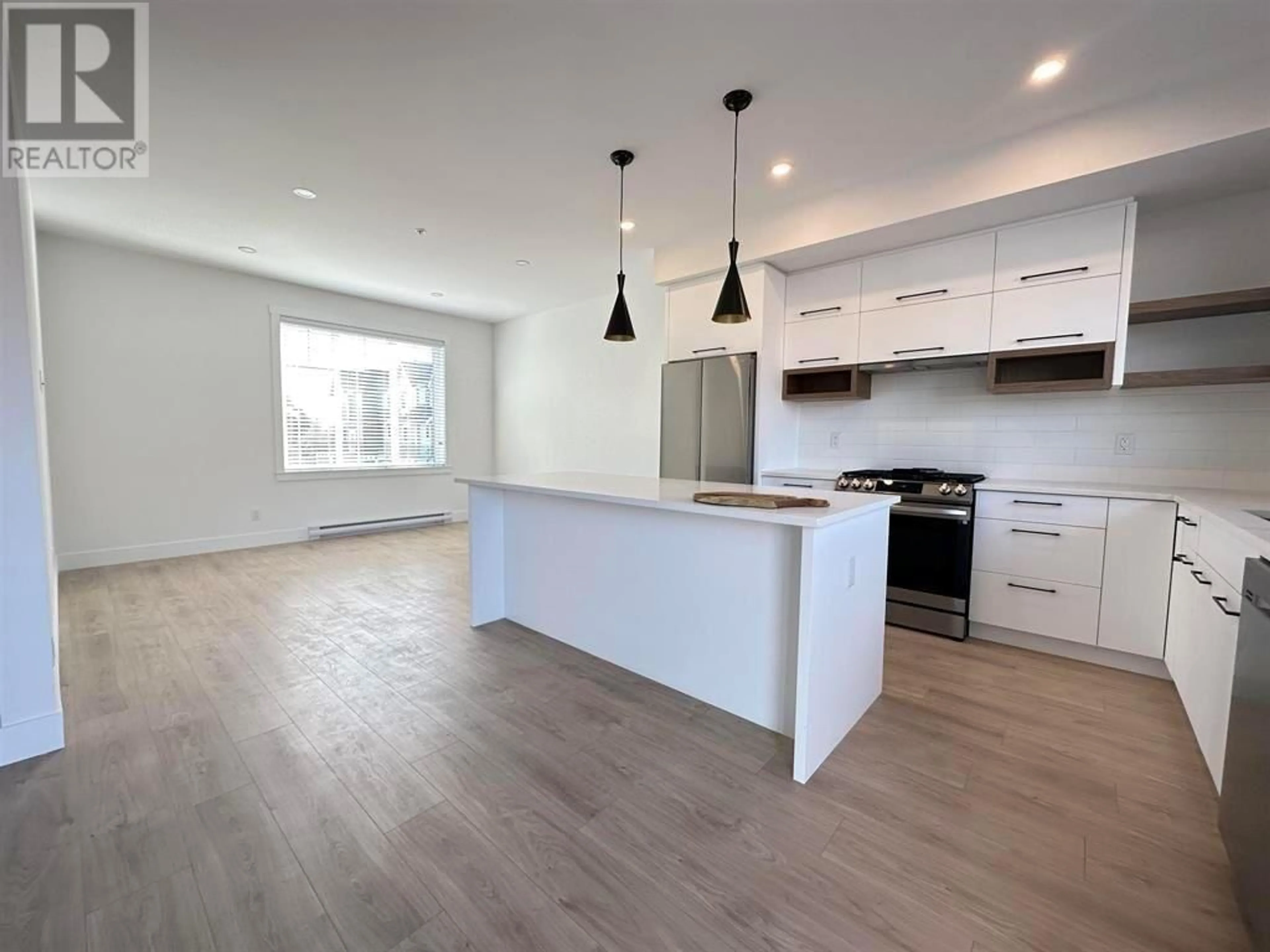 Open concept kitchen, wood/laminate floor for 6 - 12018 237 STREET, Maple Ridge British Columbia V4R0H6
