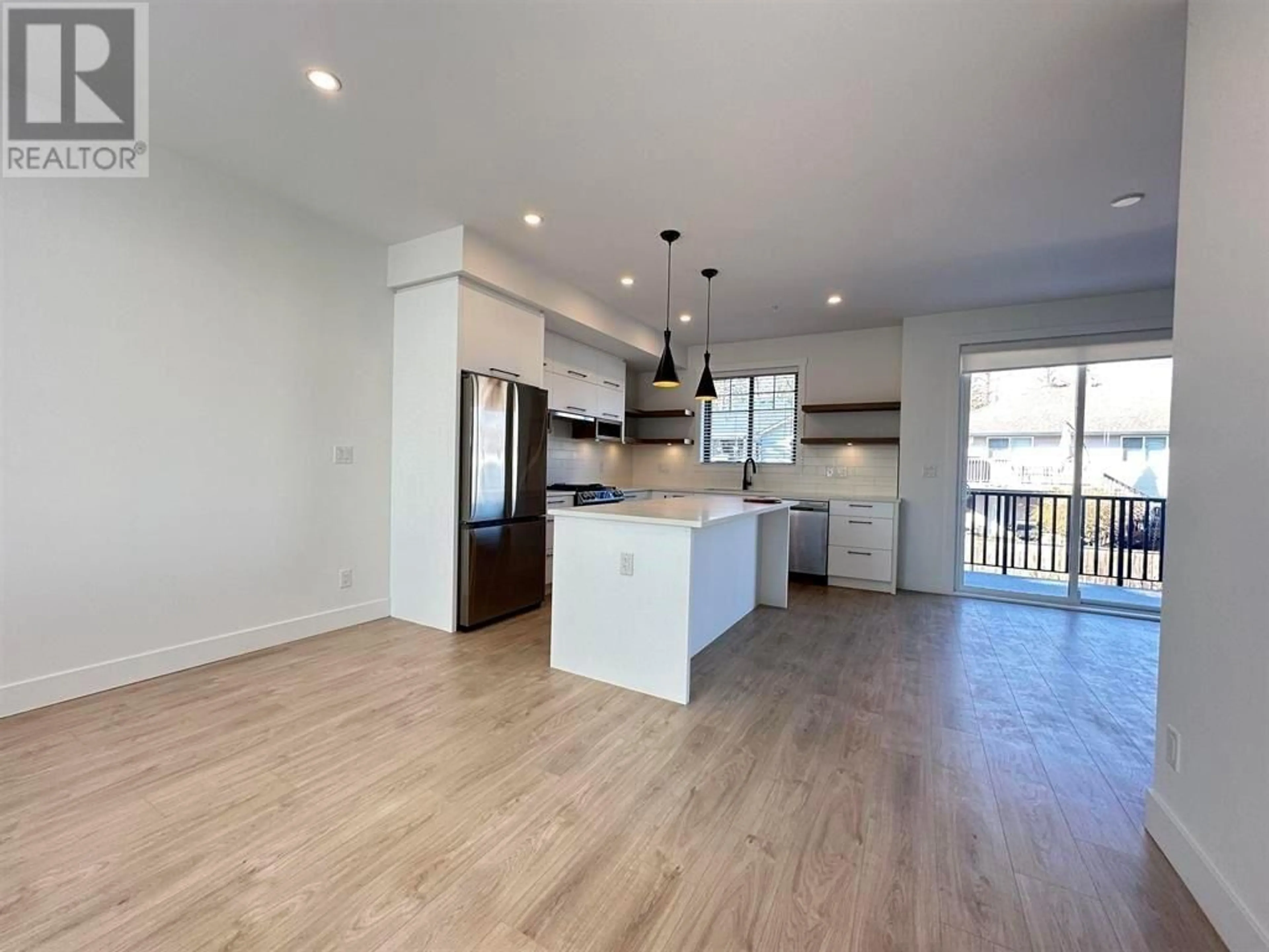 Open concept kitchen, wood/laminate floor for 6 - 12018 237 STREET, Maple Ridge British Columbia V4R0H6