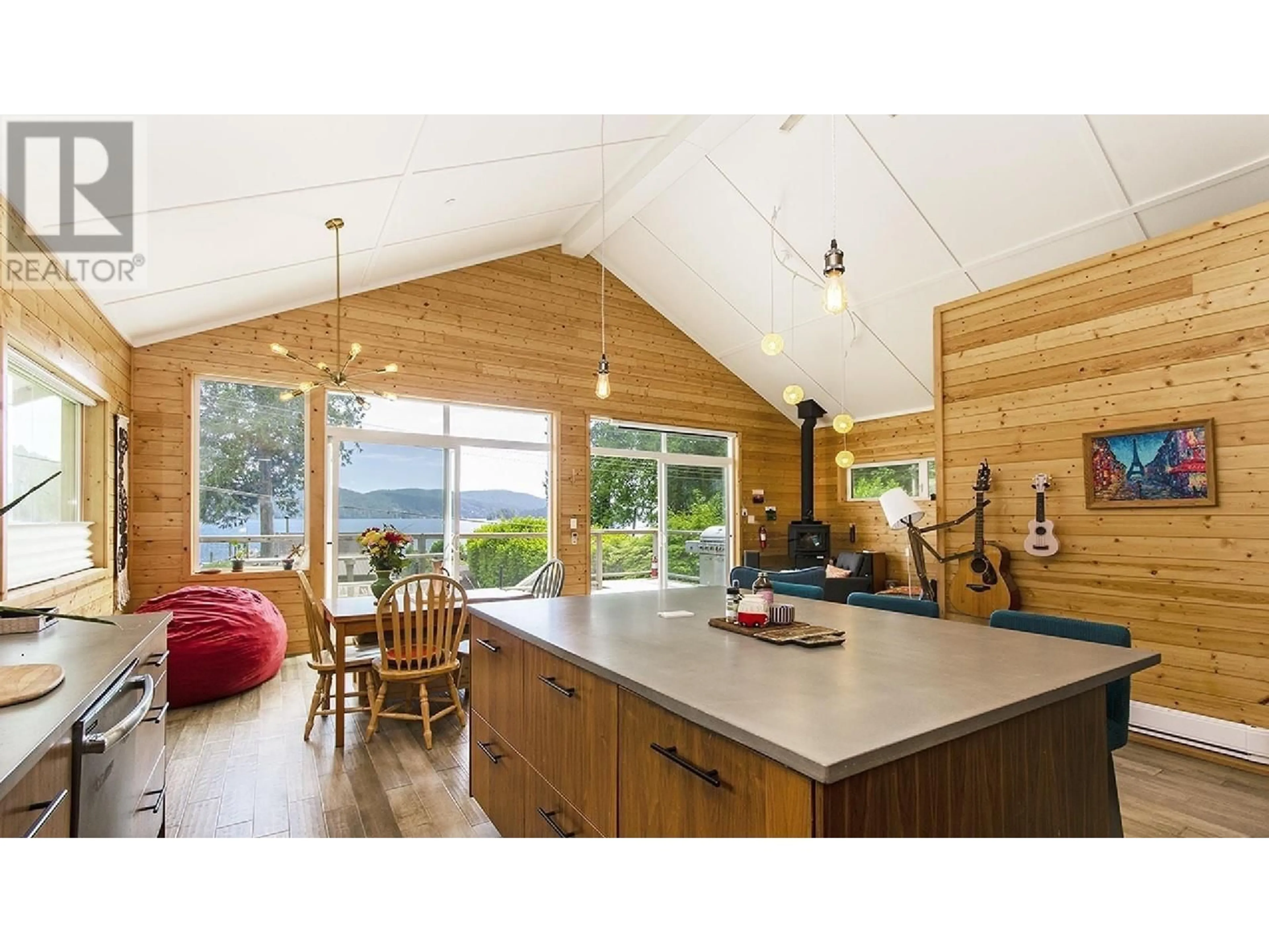 Open concept kitchen, wood/laminate floor for 6 BRIGHTON BEACH, North Vancouver British Columbia V0V0V0
