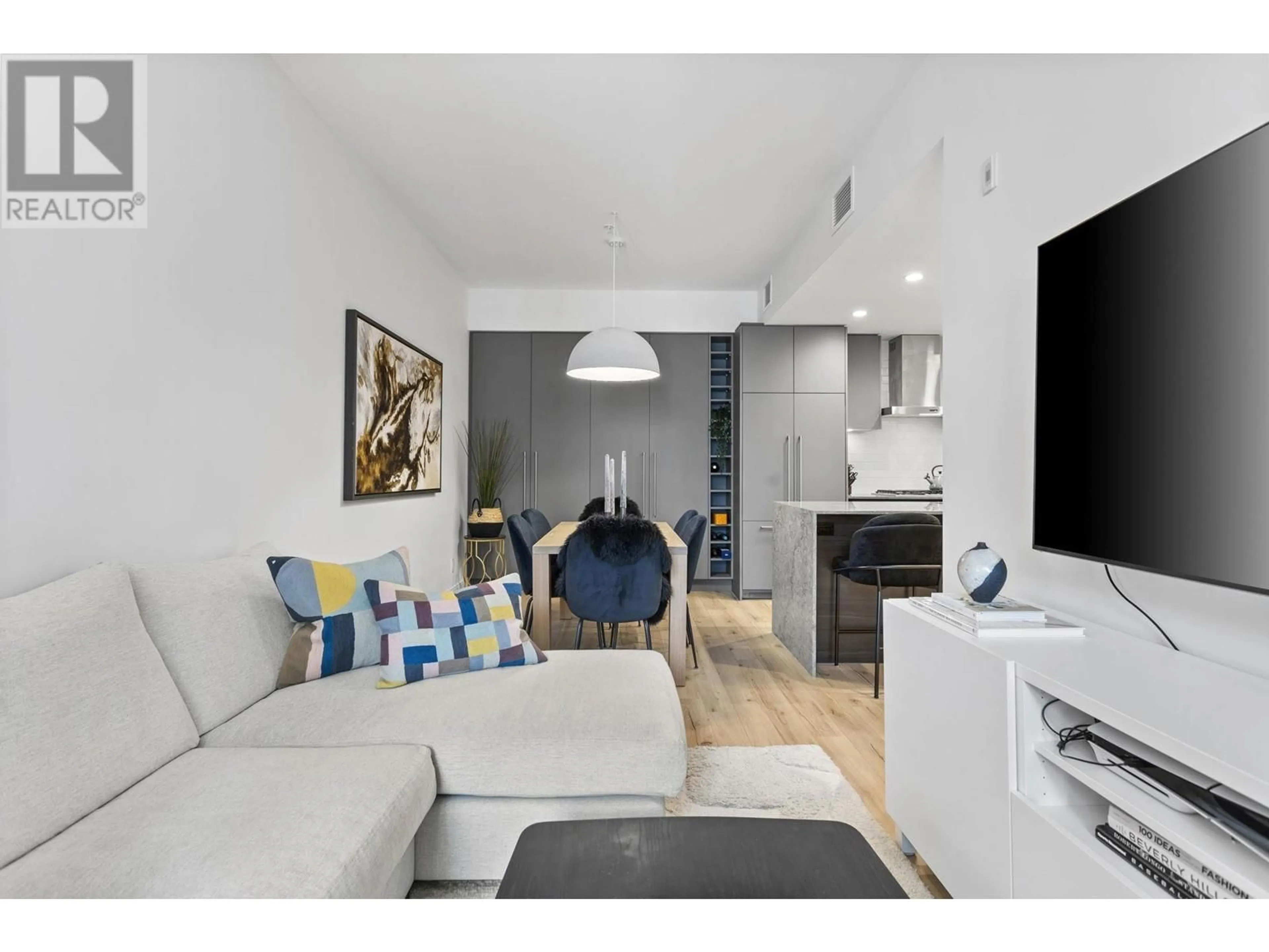 Living room with furniture, wood/laminate floor for 507 - 3131 MURRAY STREET, Port Moody British Columbia V3H0L9