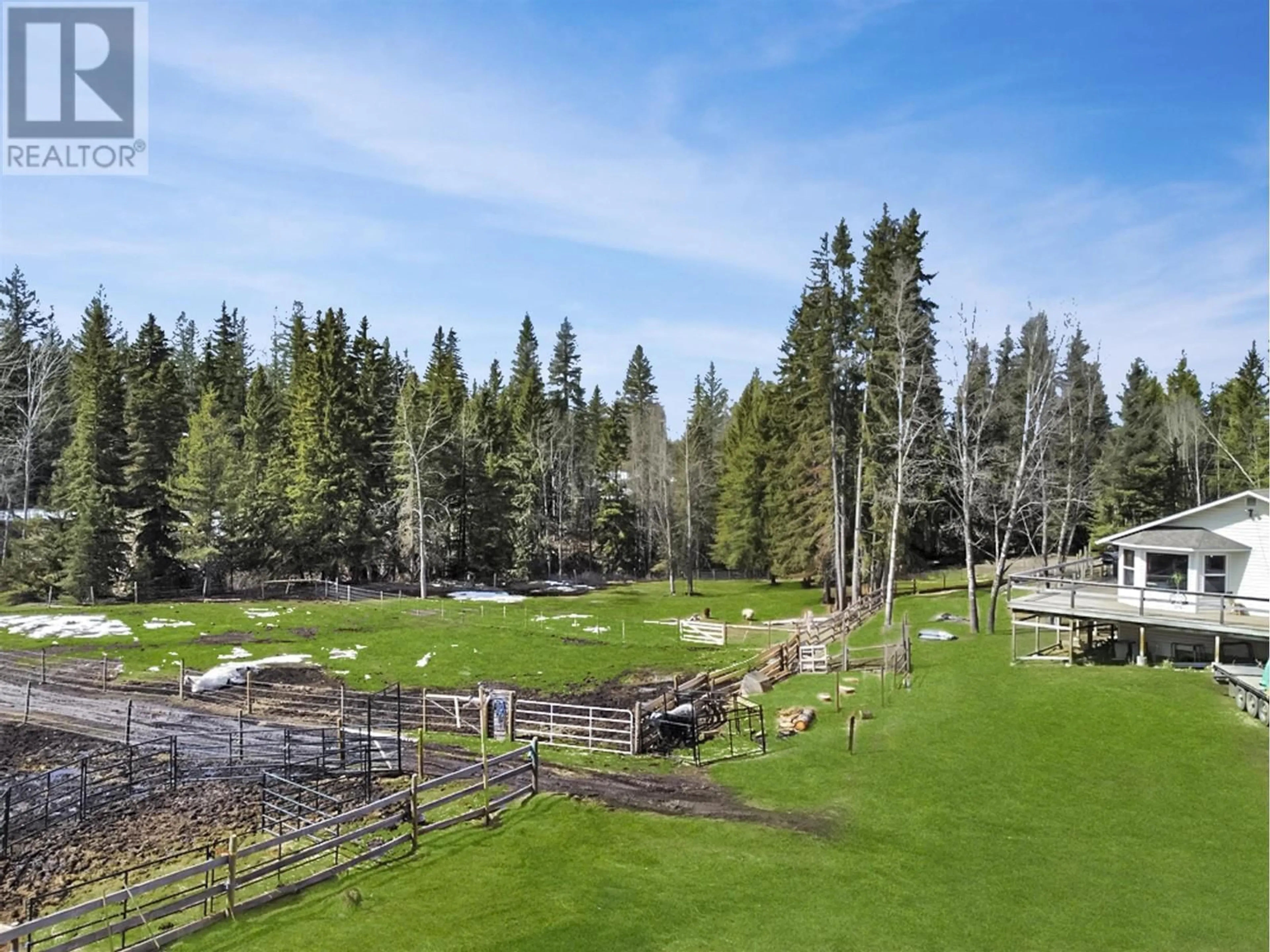 A pic from outside/outdoor area/front of a property/back of a property/a pic from drone, forest/trees view for 3736 SPOKIN LAKE ROAD, 150 Mile House British Columbia V0K2G0