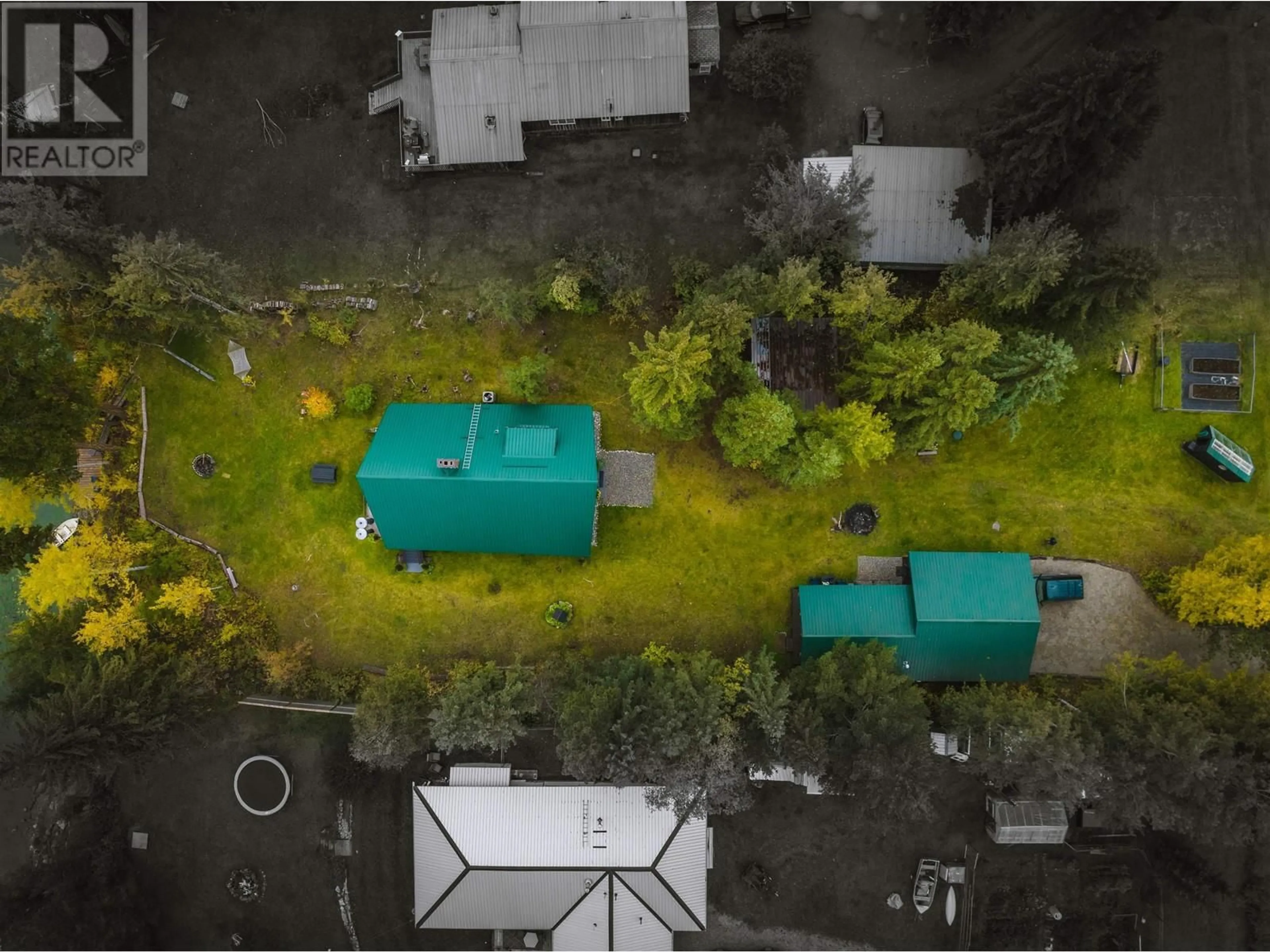 A pic from outside/outdoor area/front of a property/back of a property/a pic from drone, street for 3823 ALLPRESS ROAD, 150 Mile House British Columbia V0K2G0