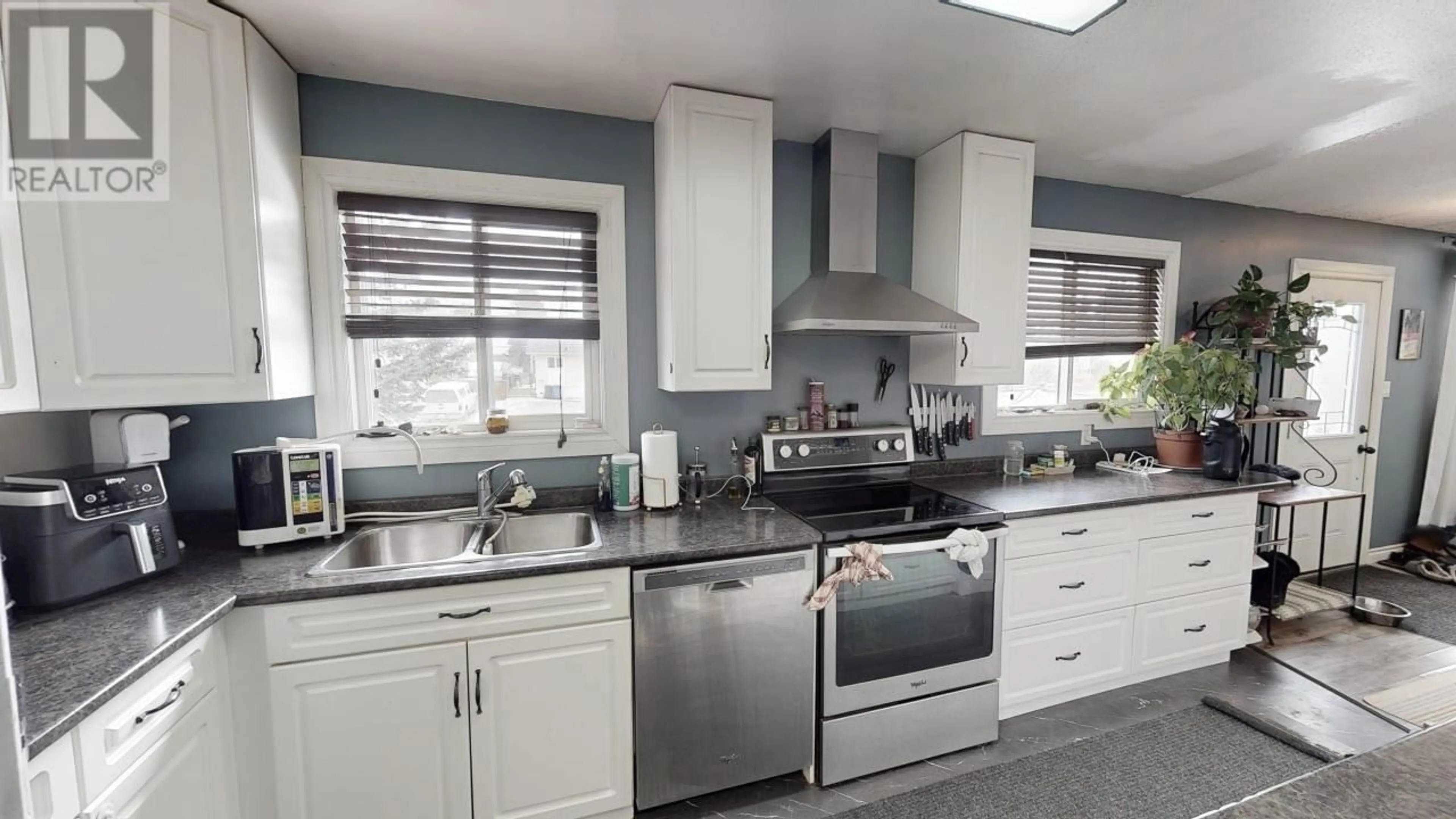 Contemporary kitchen, ceramic/tile floor for 8919 91 STREET, Fort St. John British Columbia V1J4T4