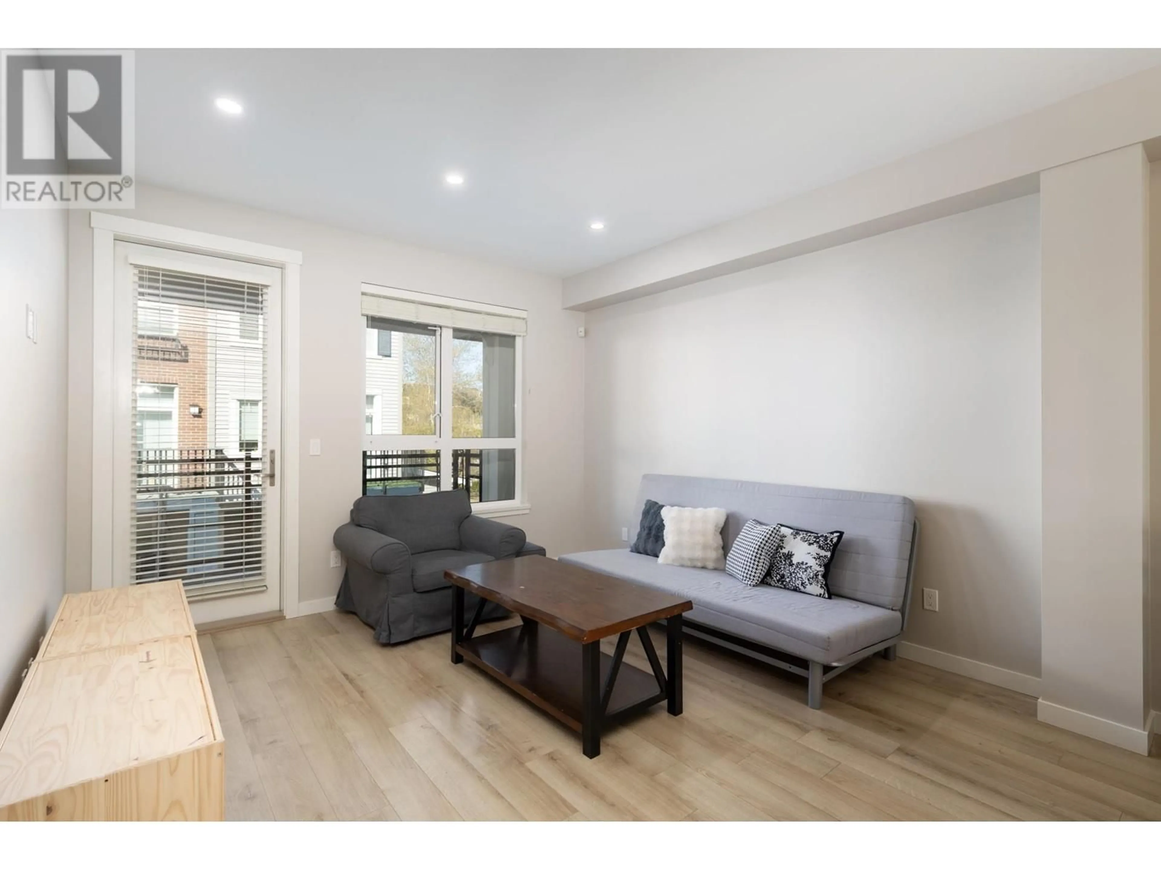 Living room with furniture, wood/laminate floor for 109 - 9671 ALBERTA ROAD, Richmond British Columbia V6Y1T7