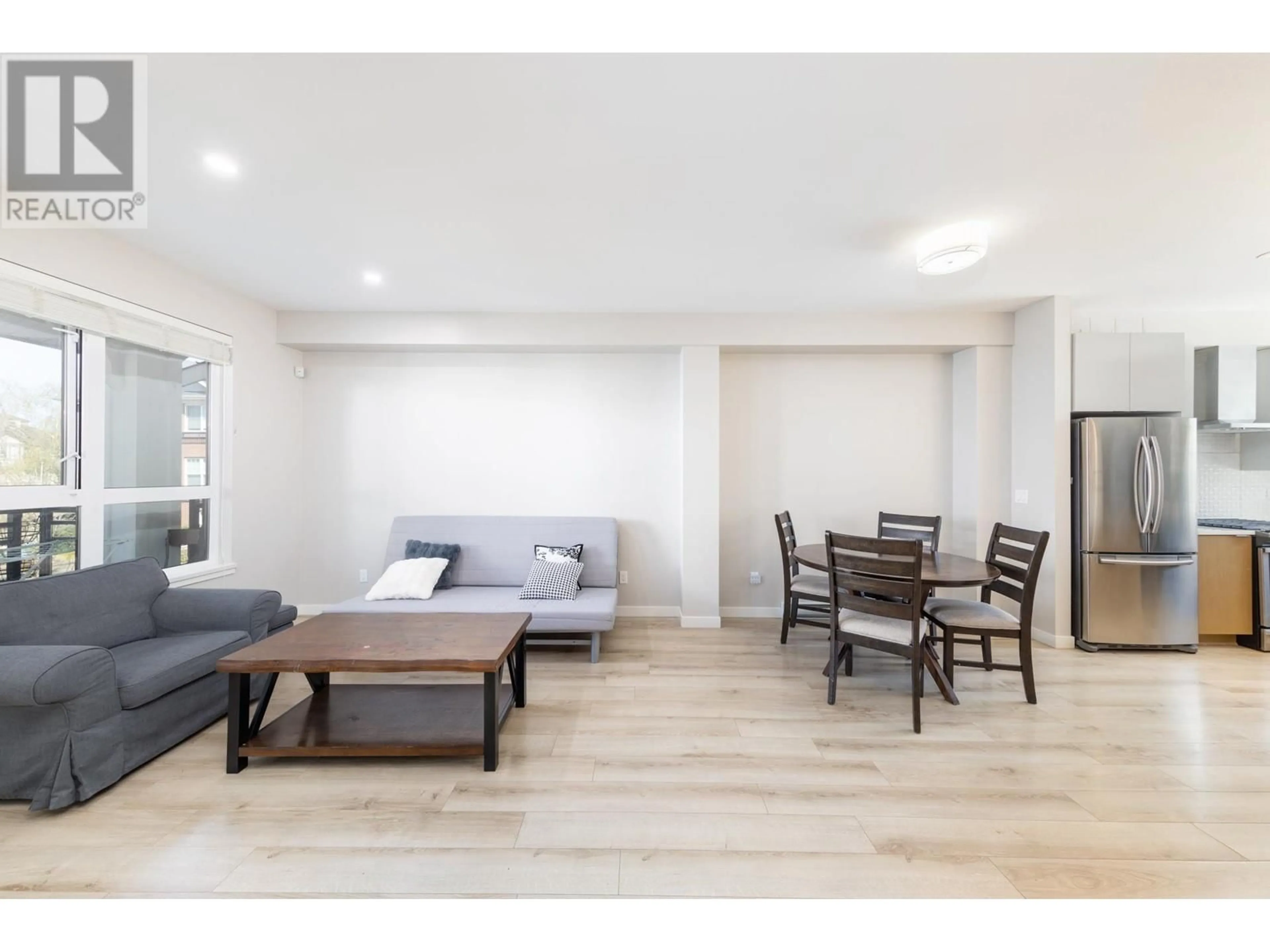 Living room with furniture, wood/laminate floor for 109 - 9671 ALBERTA ROAD, Richmond British Columbia V6Y1T7