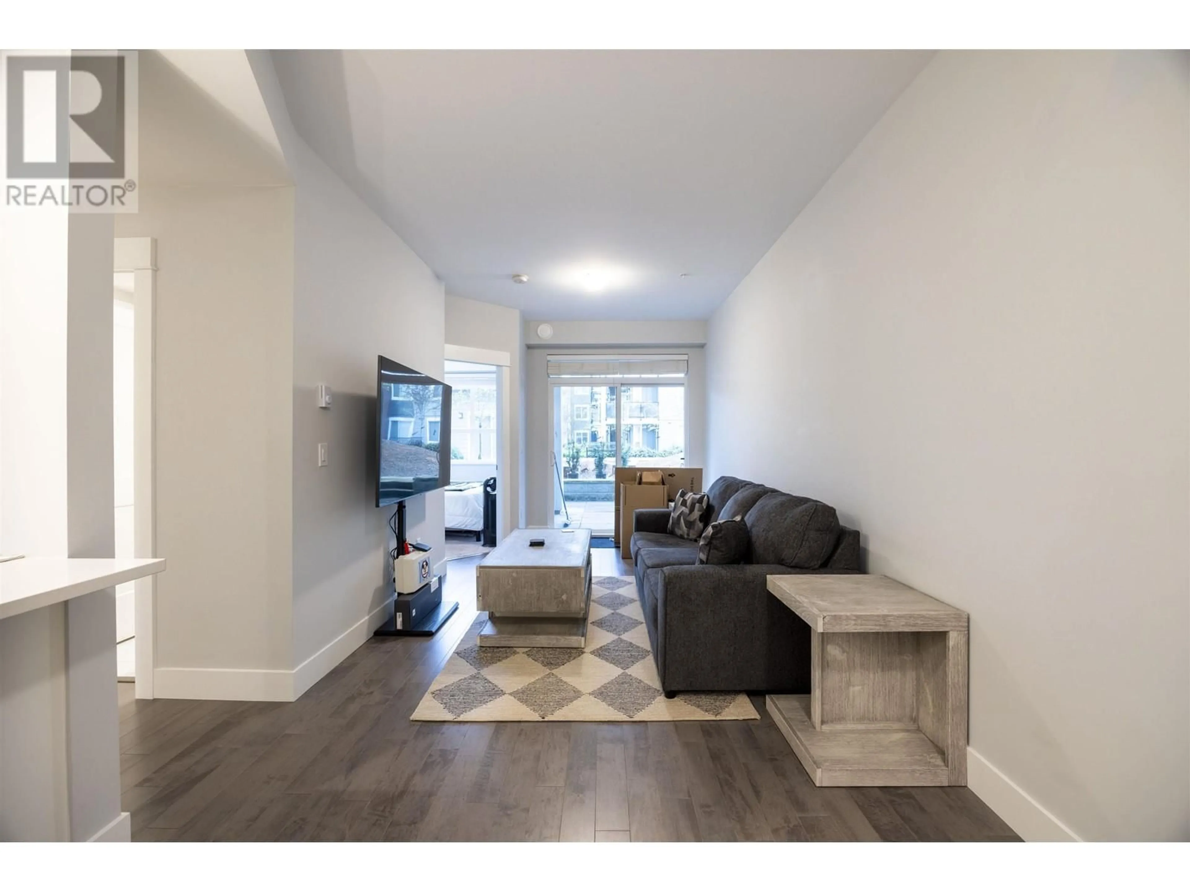 Living room with furniture, wood/laminate floor for 3218 - 2180 KELLY AVENUE, Port Coquitlam British Columbia V3C0L1