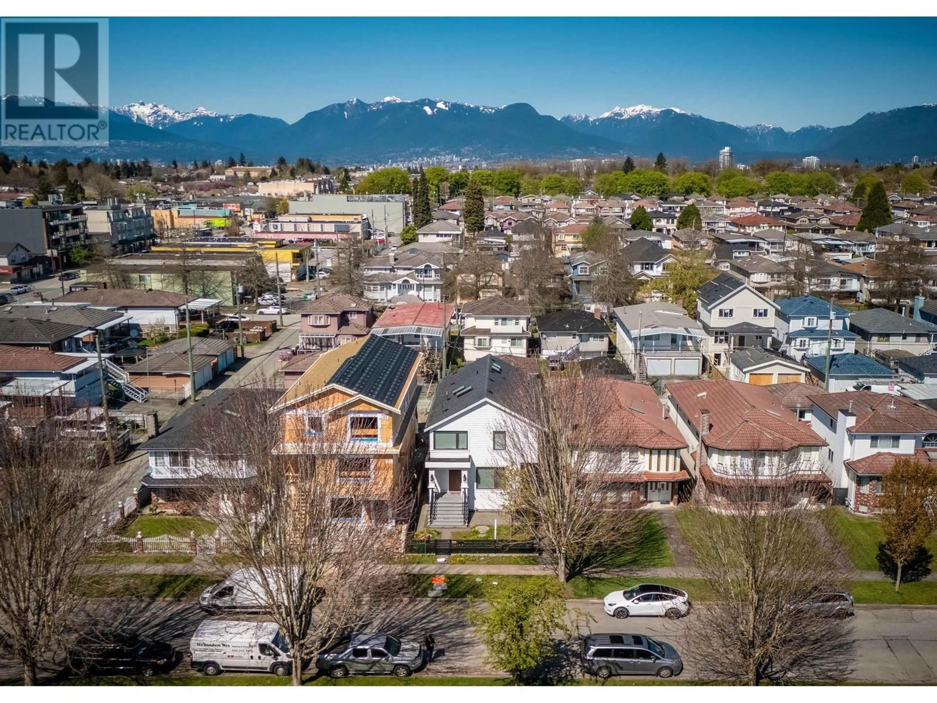 A pic from outside/outdoor area/front of a property/back of a property/a pic from drone, mountain view for 2045 E 51 AVENUE, Vancouver British Columbia V5P1W2