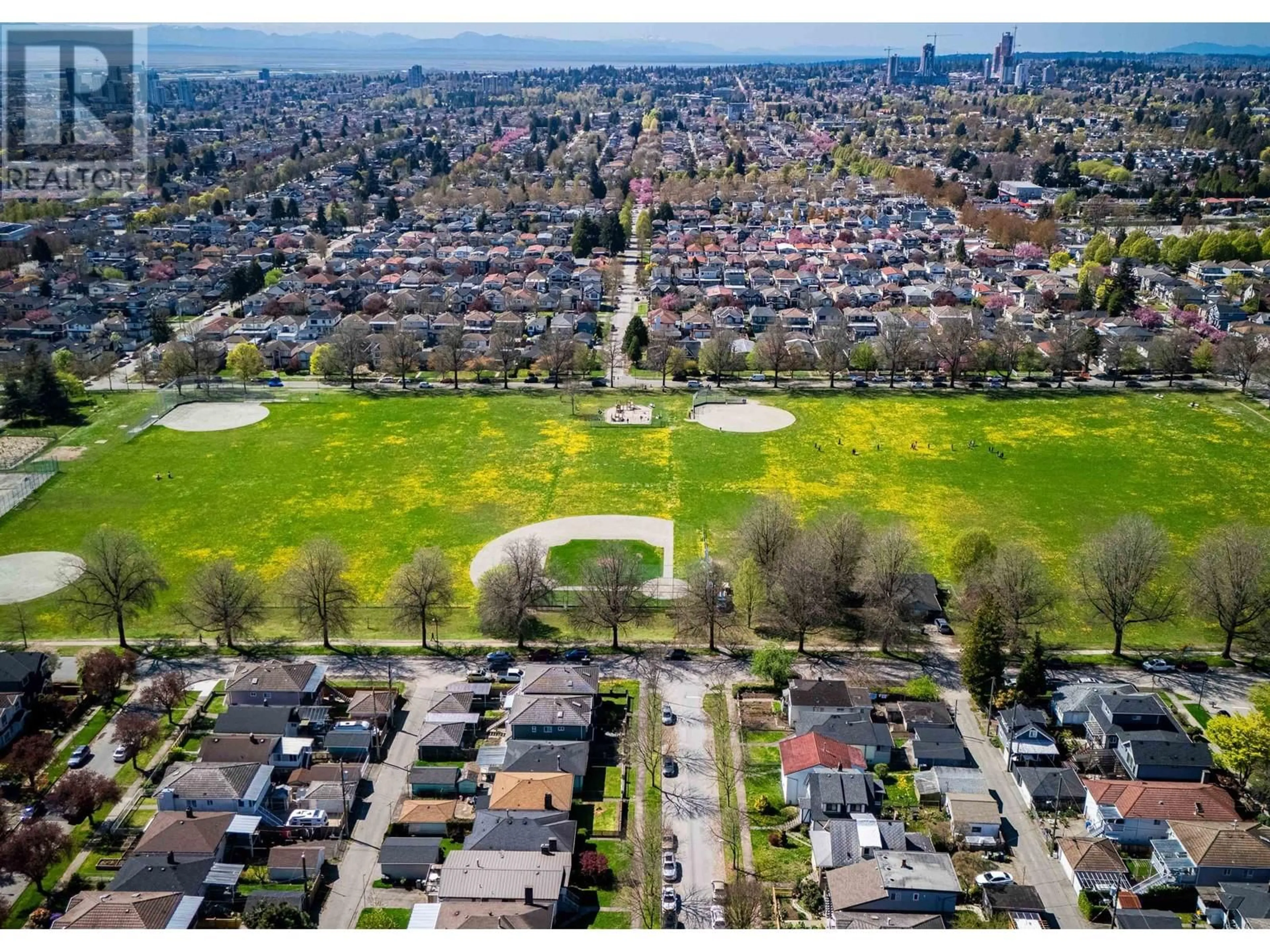 A pic from outside/outdoor area/front of a property/back of a property/a pic from drone, street for 2045 E 51 AVENUE, Vancouver British Columbia V5P1W2