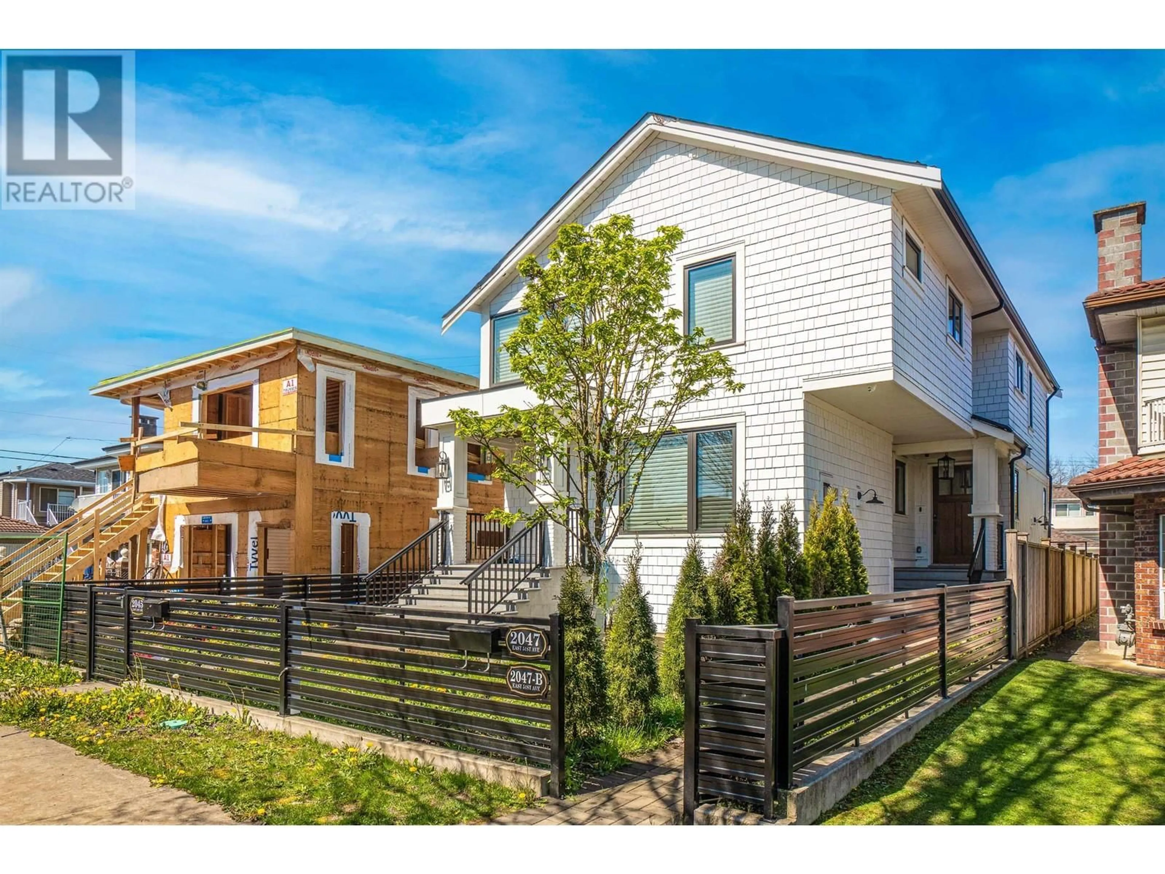 Home with vinyl exterior material, street for 2047 E 51 AVENUE, Vancouver British Columbia V5P1W2