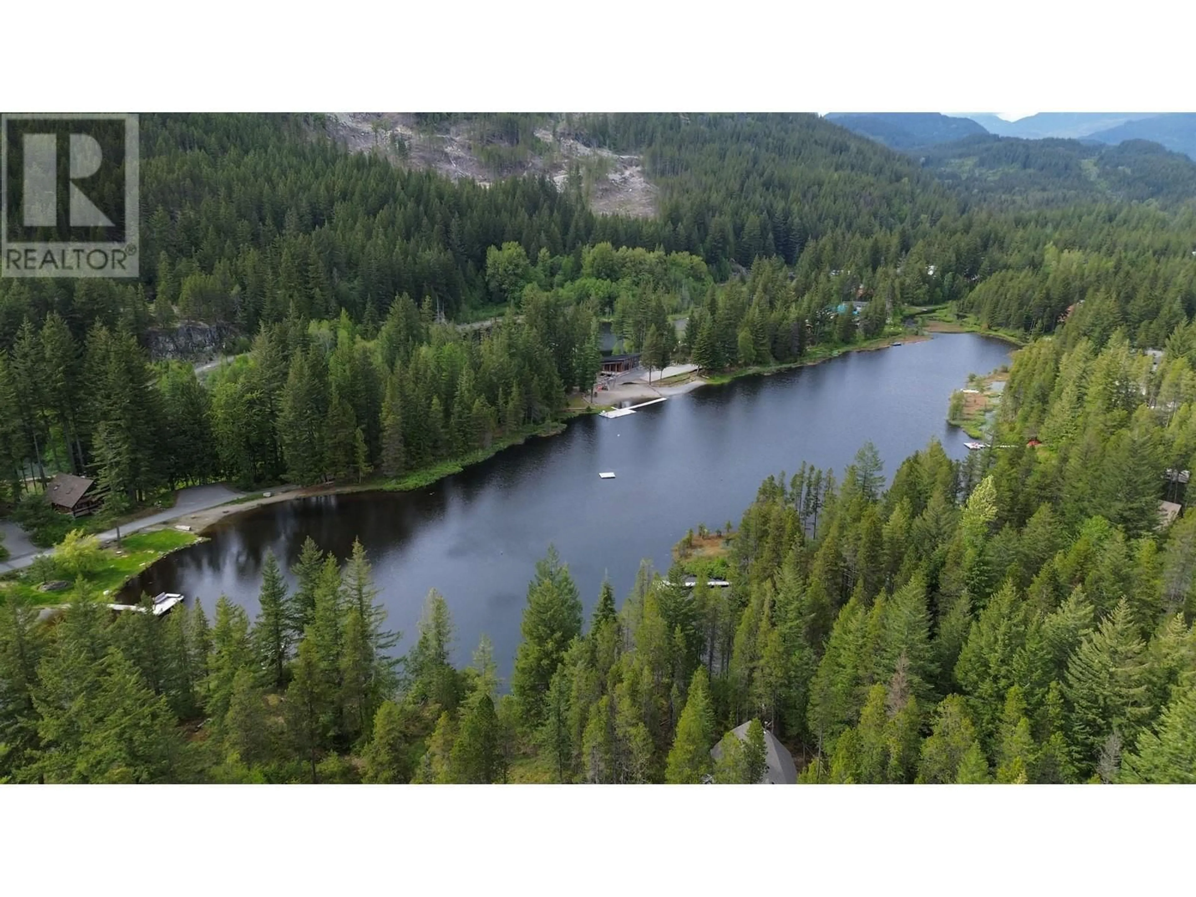 A pic from outside/outdoor area/front of a property/back of a property/a pic from drone, water/lake/river/ocean view for 49 PINE LOOP, Whistler British Columbia V8E0A1