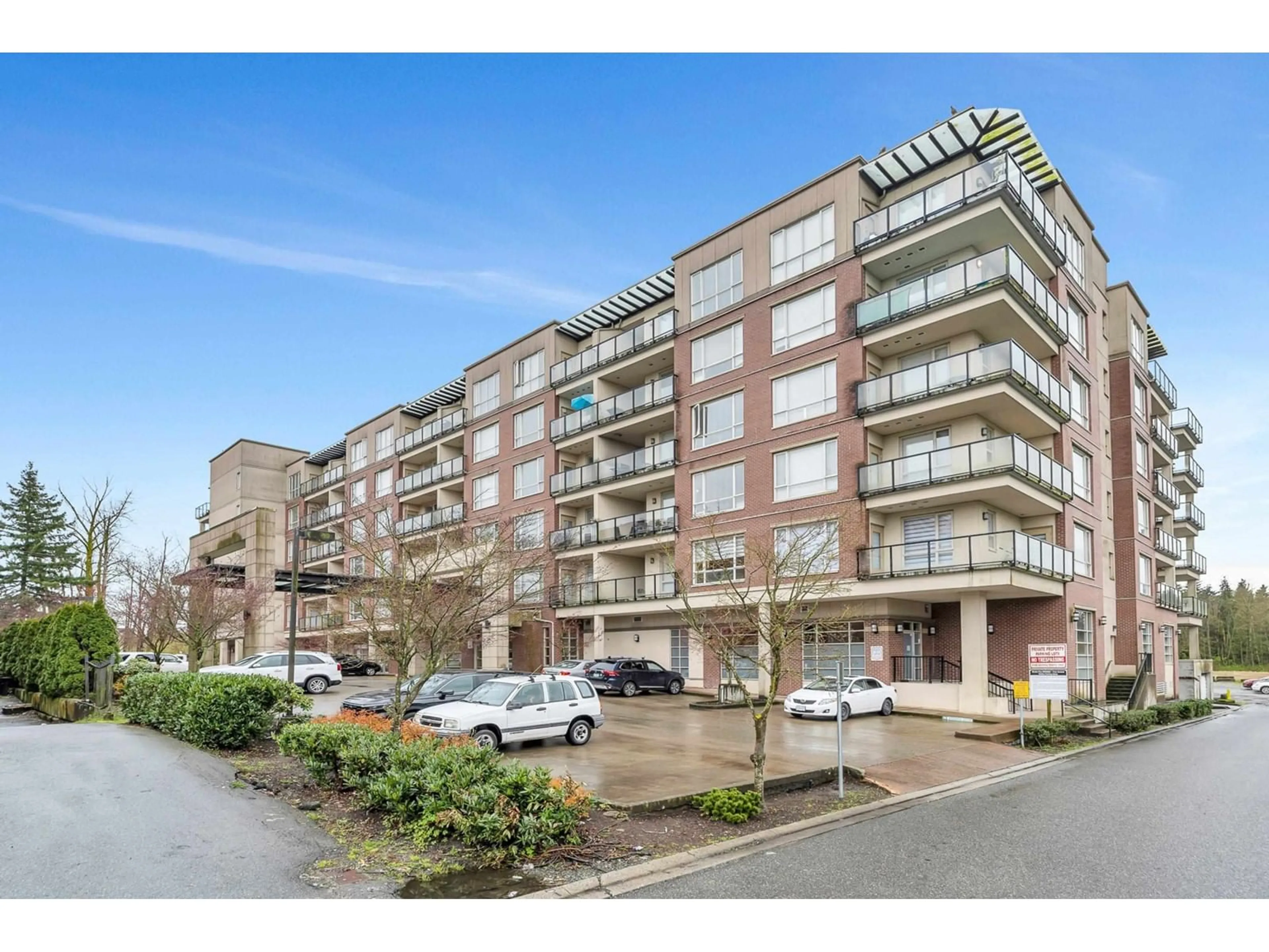 A pic from outside/outdoor area/front of a property/back of a property/a pic from drone, street for 320 - 14333 104, Surrey British Columbia V3T0E1
