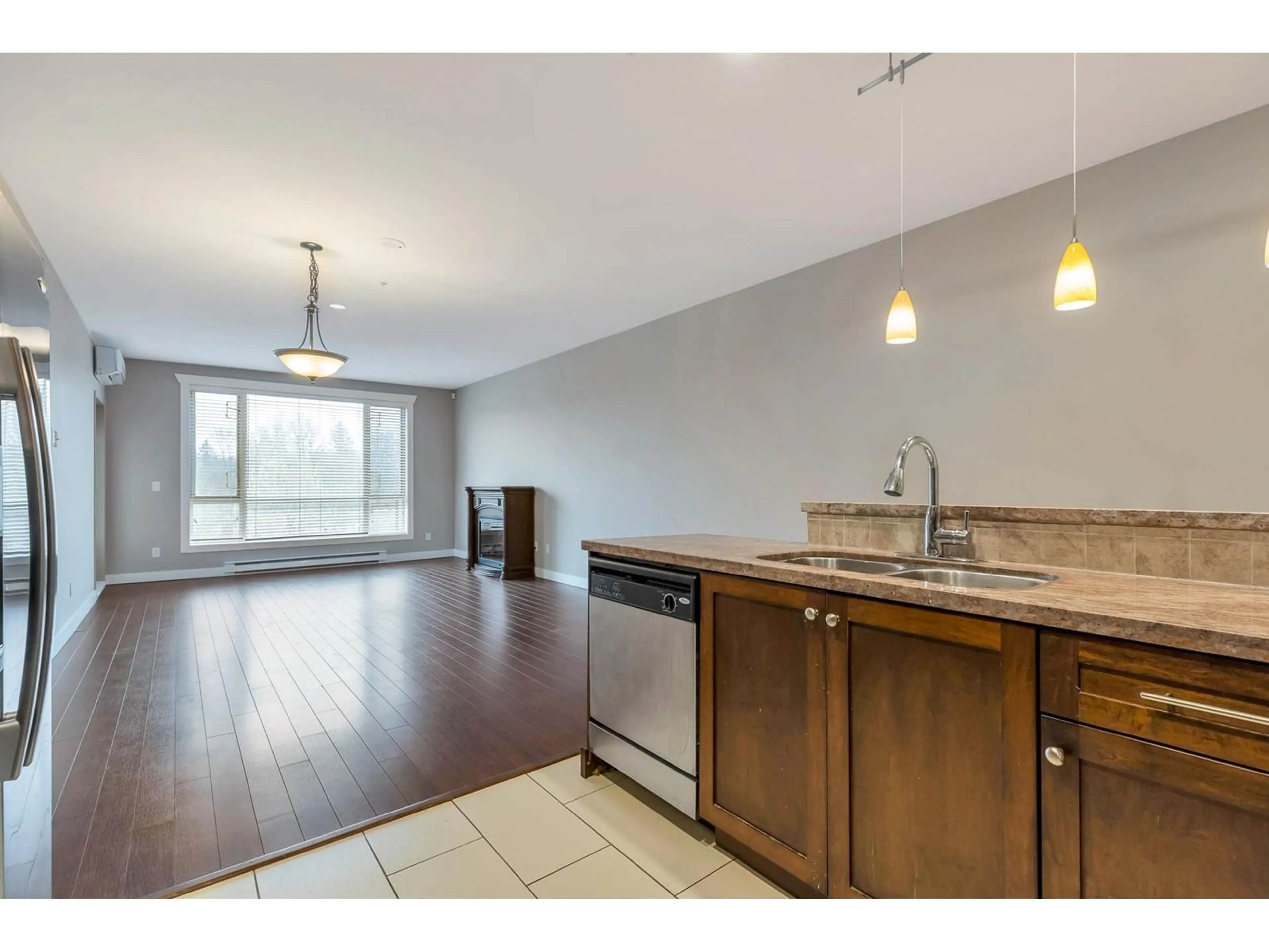 Open concept kitchen, unknown for 320 - 14333 104, Surrey British Columbia V3T0E1