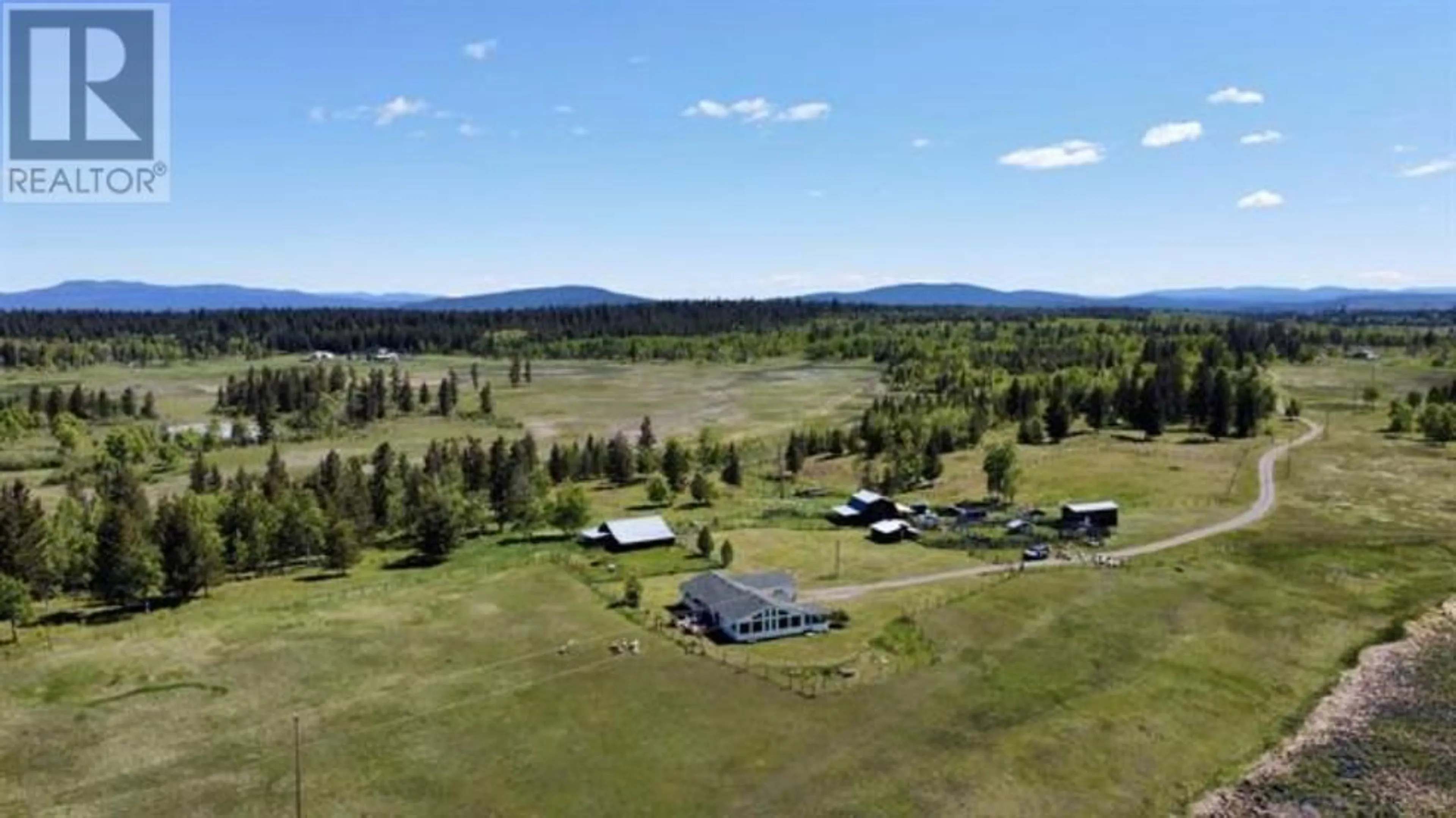 A pic from outside/outdoor area/front of a property/back of a property/a pic from drone, mountain view for 5028 ABEL LAKE ROAD, 100 Mile House British Columbia V0K2E1