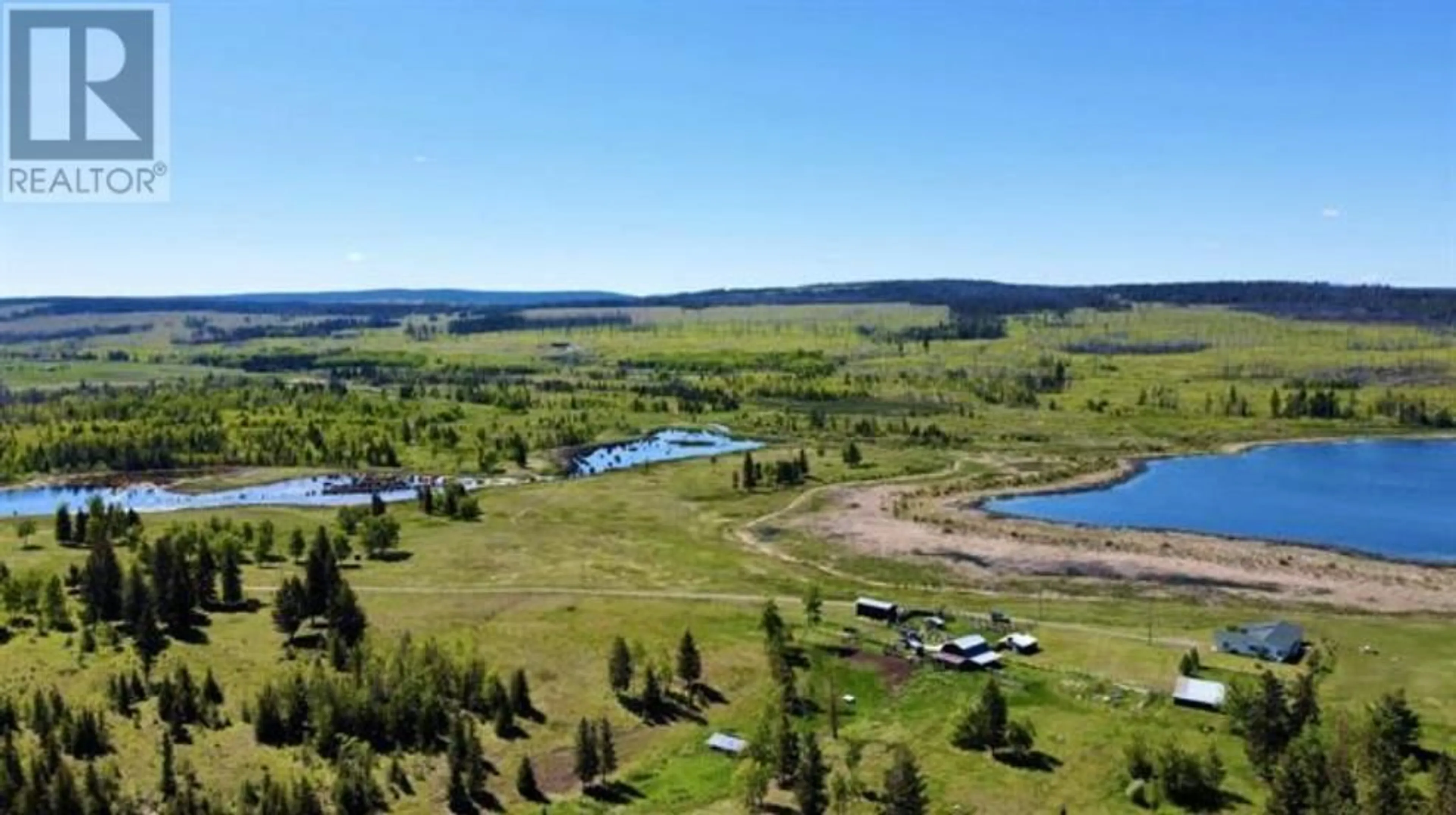 A pic from outside/outdoor area/front of a property/back of a property/a pic from drone, water/lake/river/ocean view for 5028 ABEL LAKE ROAD, 100 Mile House British Columbia V0K2E1