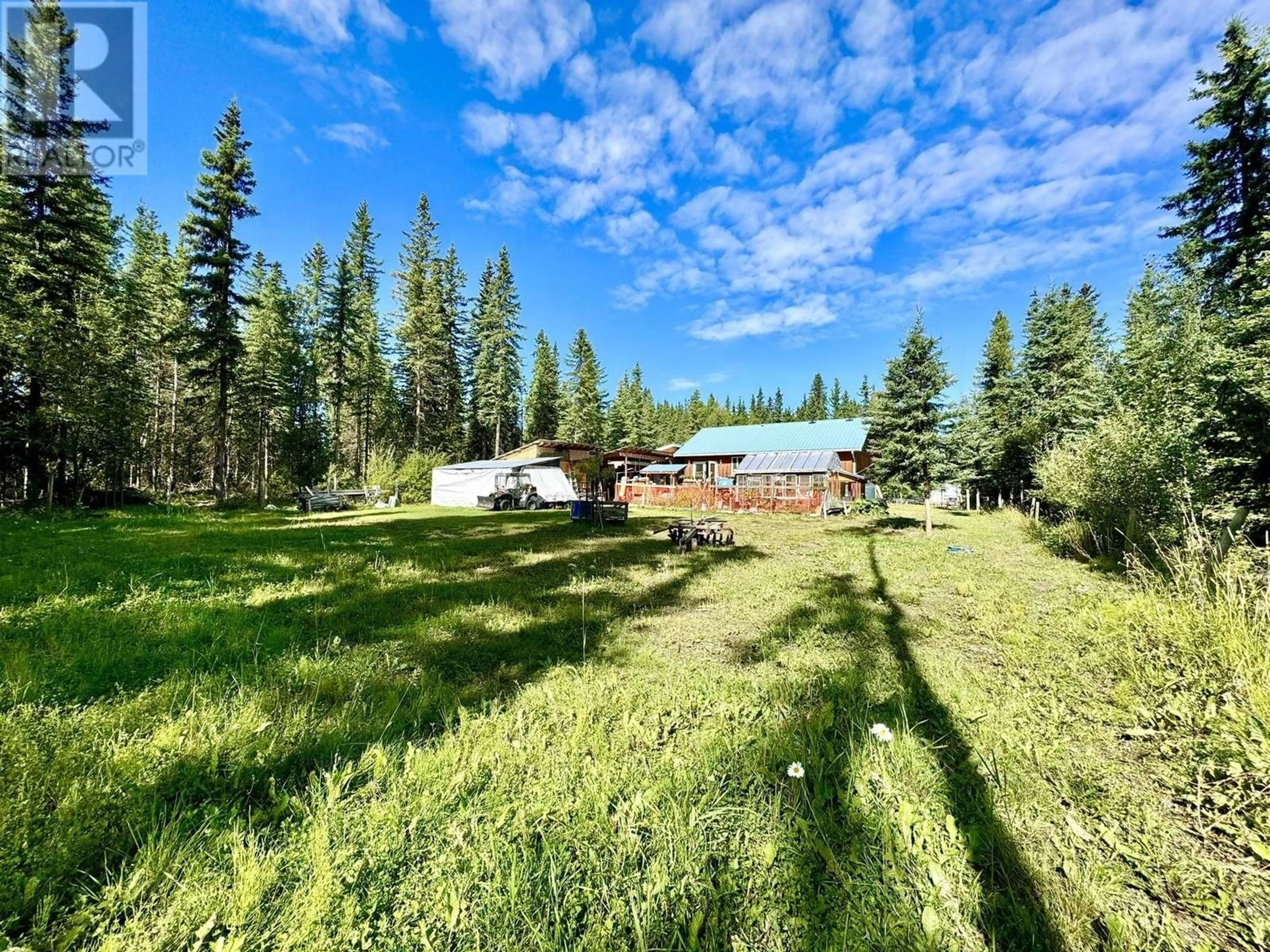 A pic from outside/outdoor area/front of a property/back of a property/a pic from drone, forest/trees view for 7636 KING ROAD, Deka Lake / Sulphurous / Hathaway Lakes British Columbia V0K1X3