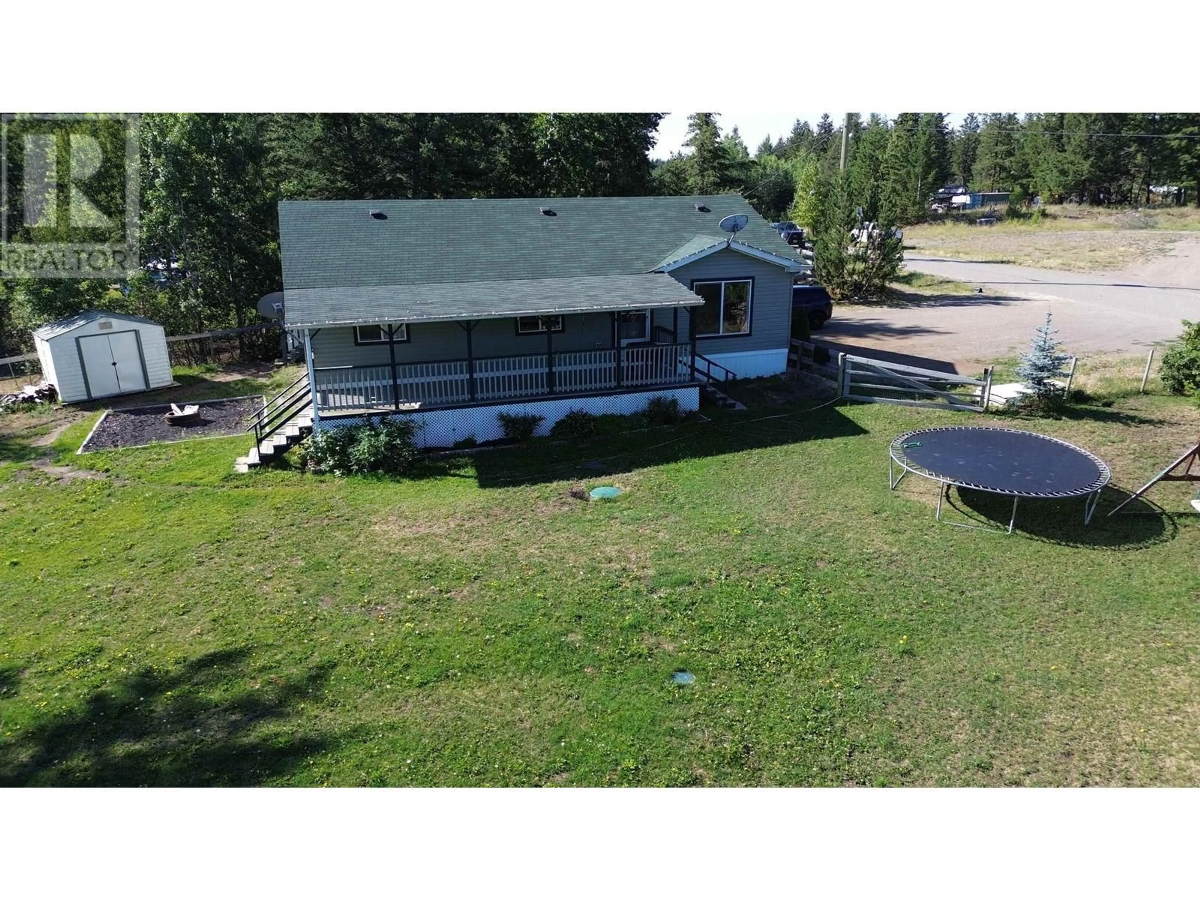 A pic from outside/outdoor area/front of a property/back of a property/a pic from drone, unknown for 3024 PIGEON ROAD, 150 Mile House British Columbia V0K2G0