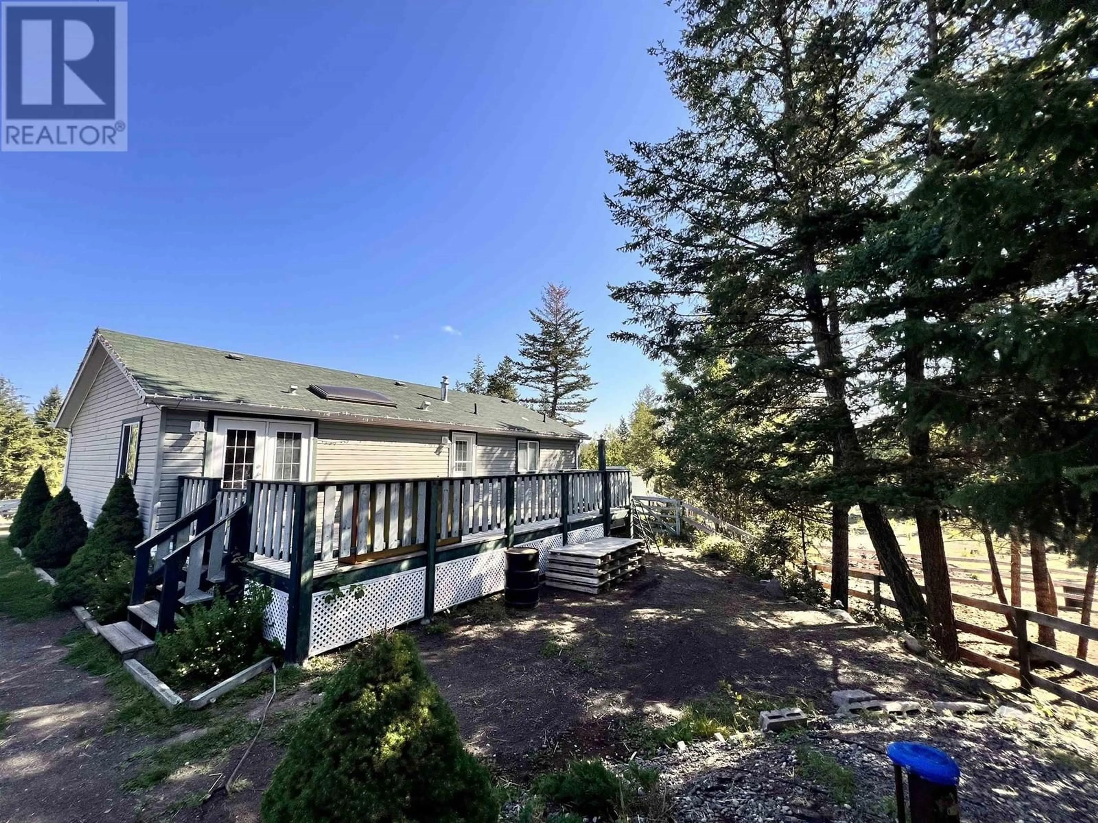 A pic from outside/outdoor area/front of a property/back of a property/a pic from drone, unknown for 3024 PIGEON ROAD, 150 Mile House British Columbia V0K2G0