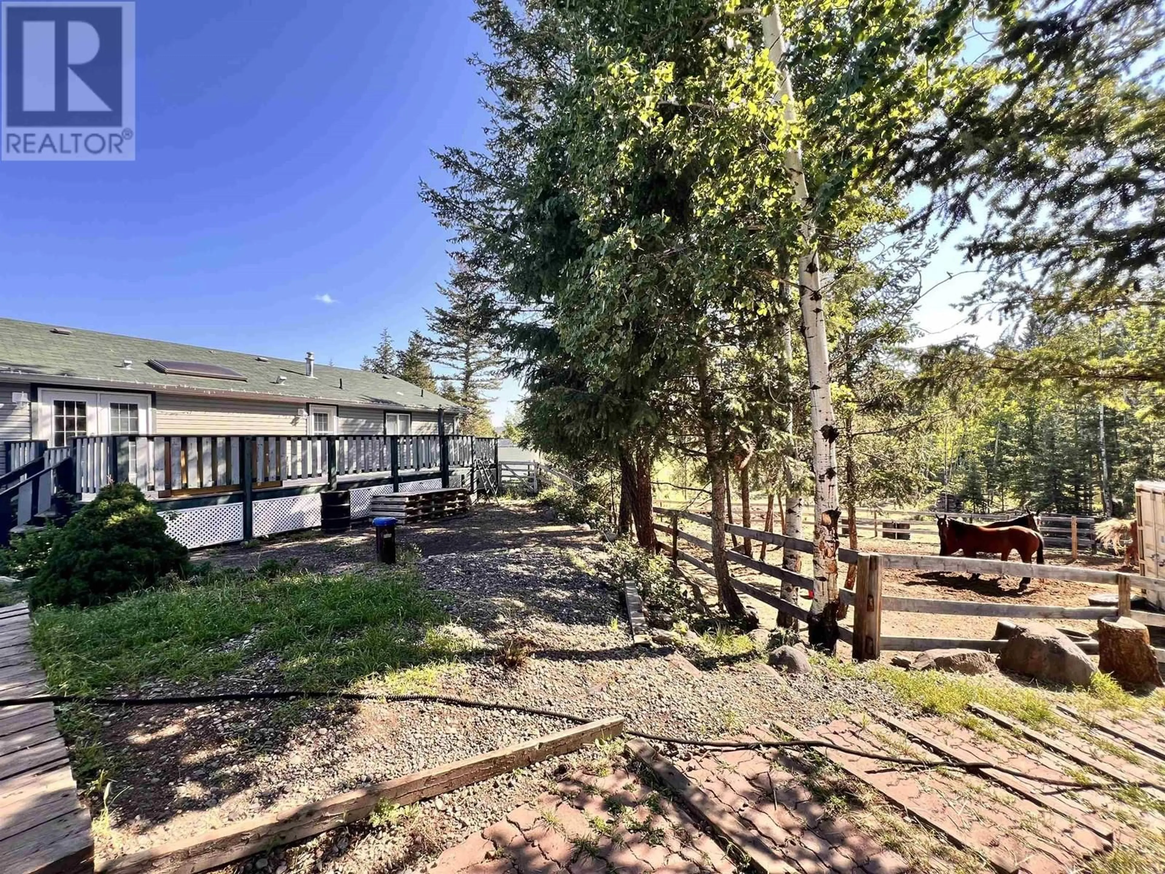 A pic from outside/outdoor area/front of a property/back of a property/a pic from drone, forest/trees view for 3024 PIGEON ROAD, 150 Mile House British Columbia V0K2G0