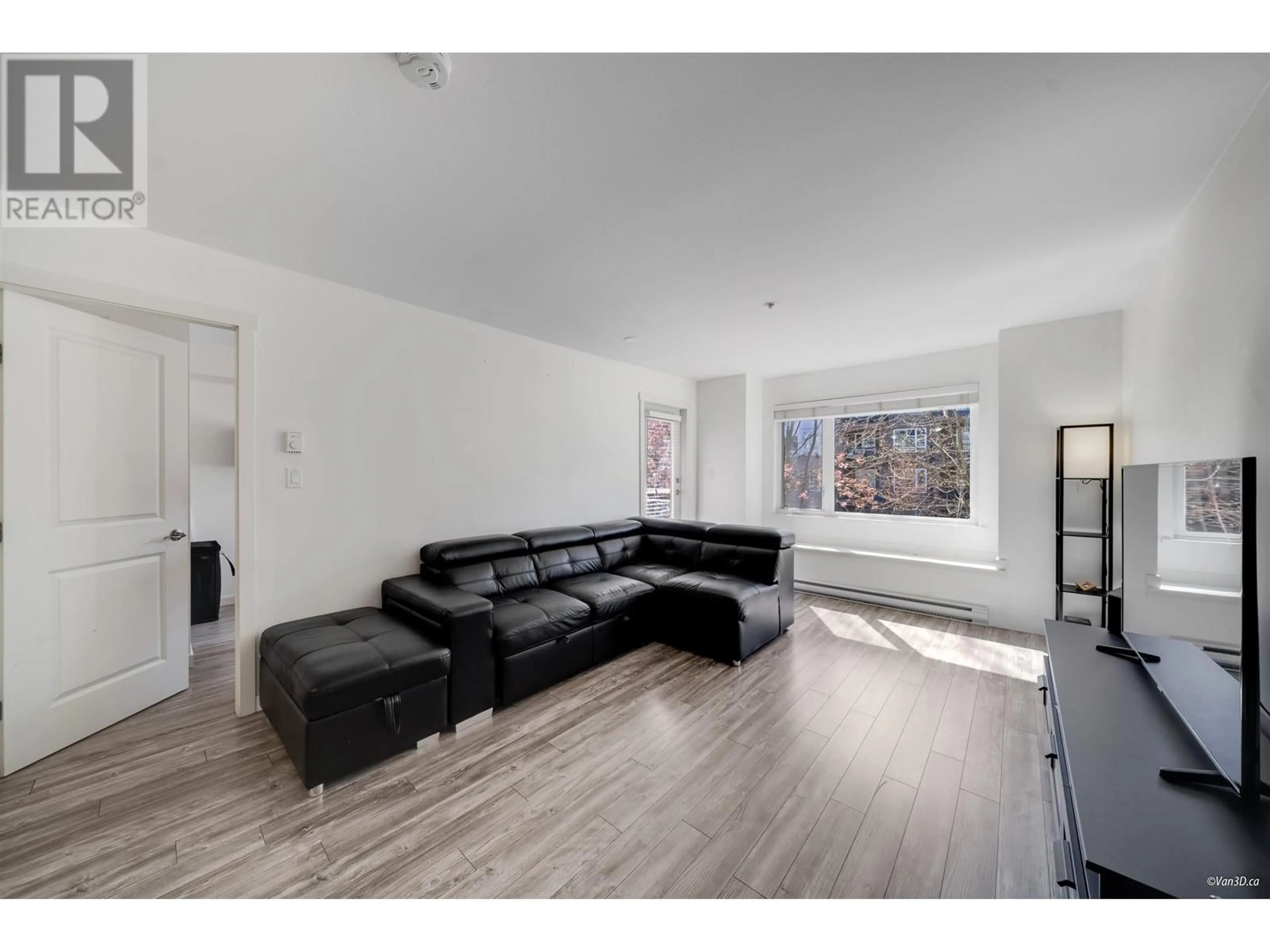Living room with furniture, unknown for 211 - 2373 ATKINS AVENUE, Port Coquitlam British Columbia V3C1Y7