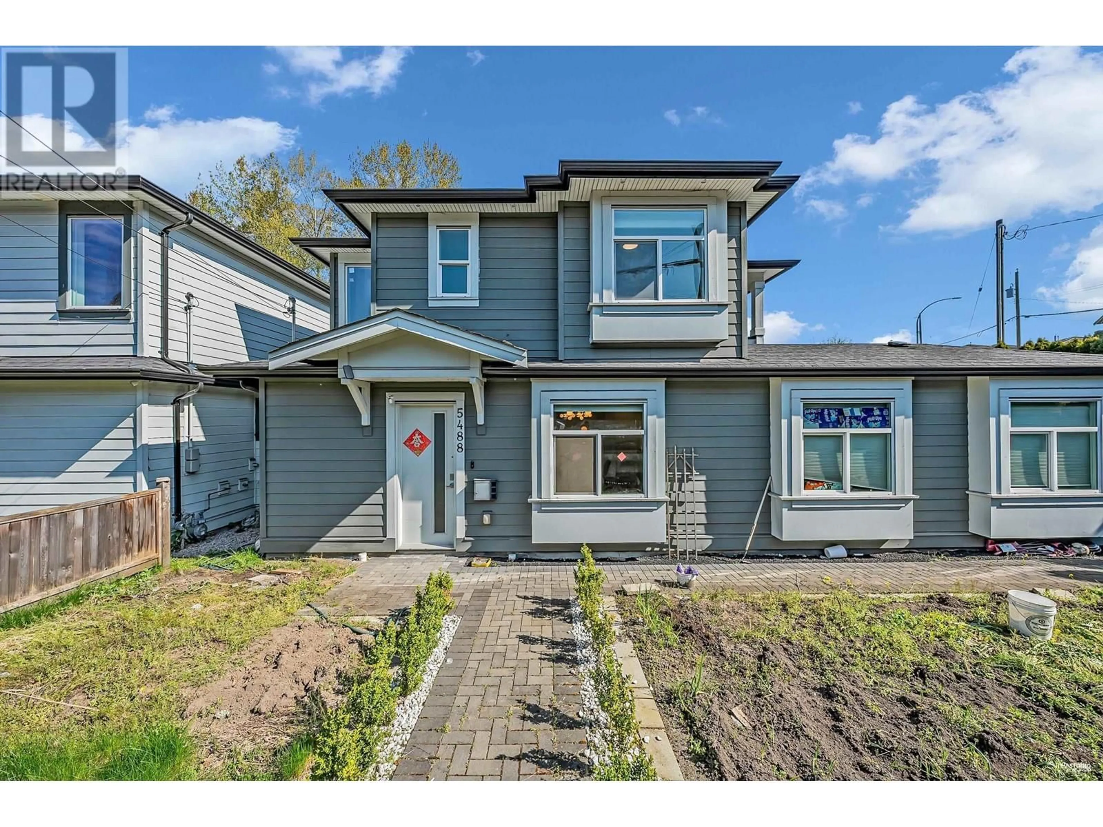 Home with vinyl exterior material, street for 5488 CANADA WAY, Burnaby British Columbia V5E3N3