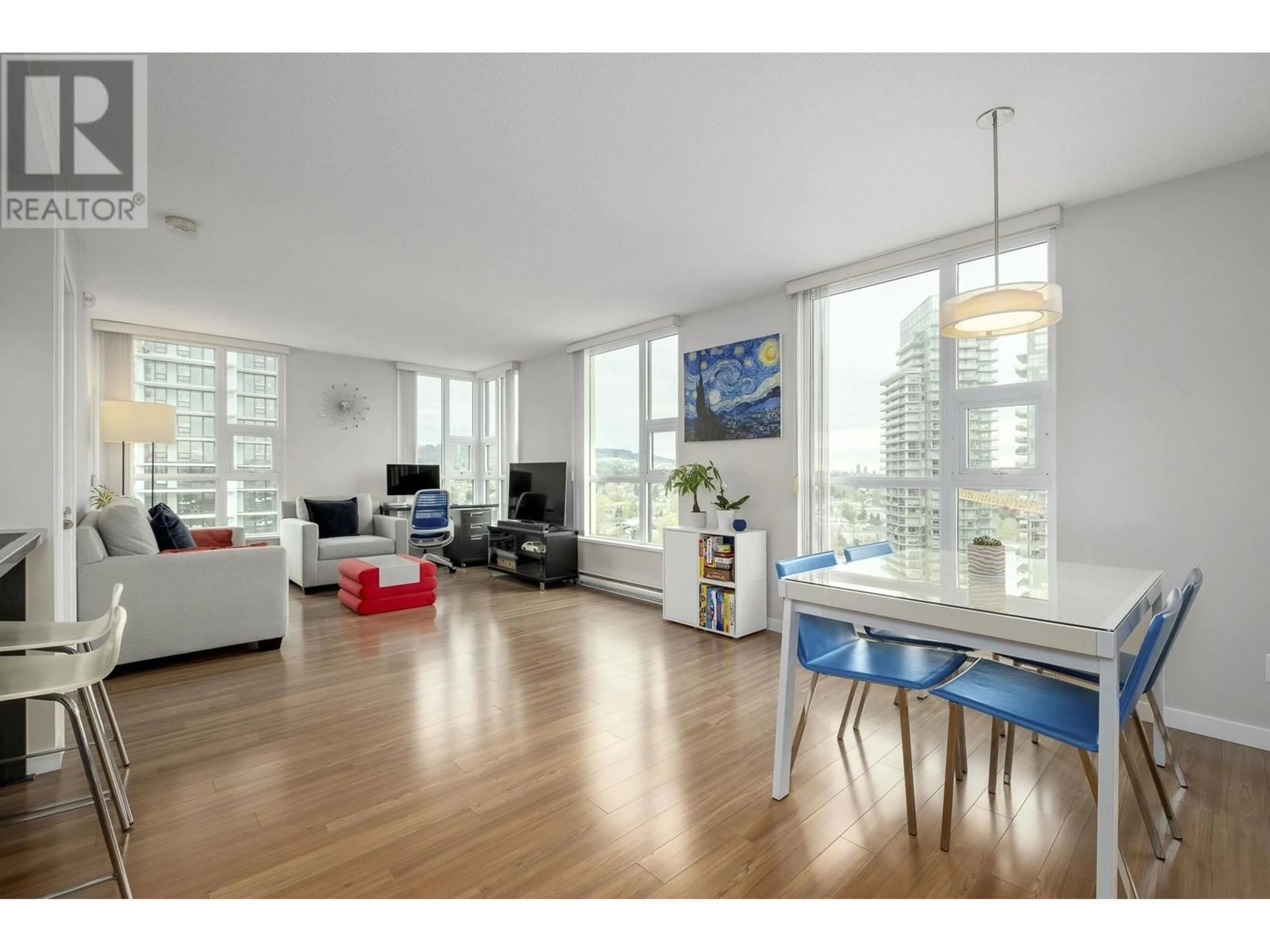 Living room with furniture, wood/laminate floor for 1706 - 2232 DOUGLAS ROAD, Burnaby British Columbia V5C5A7