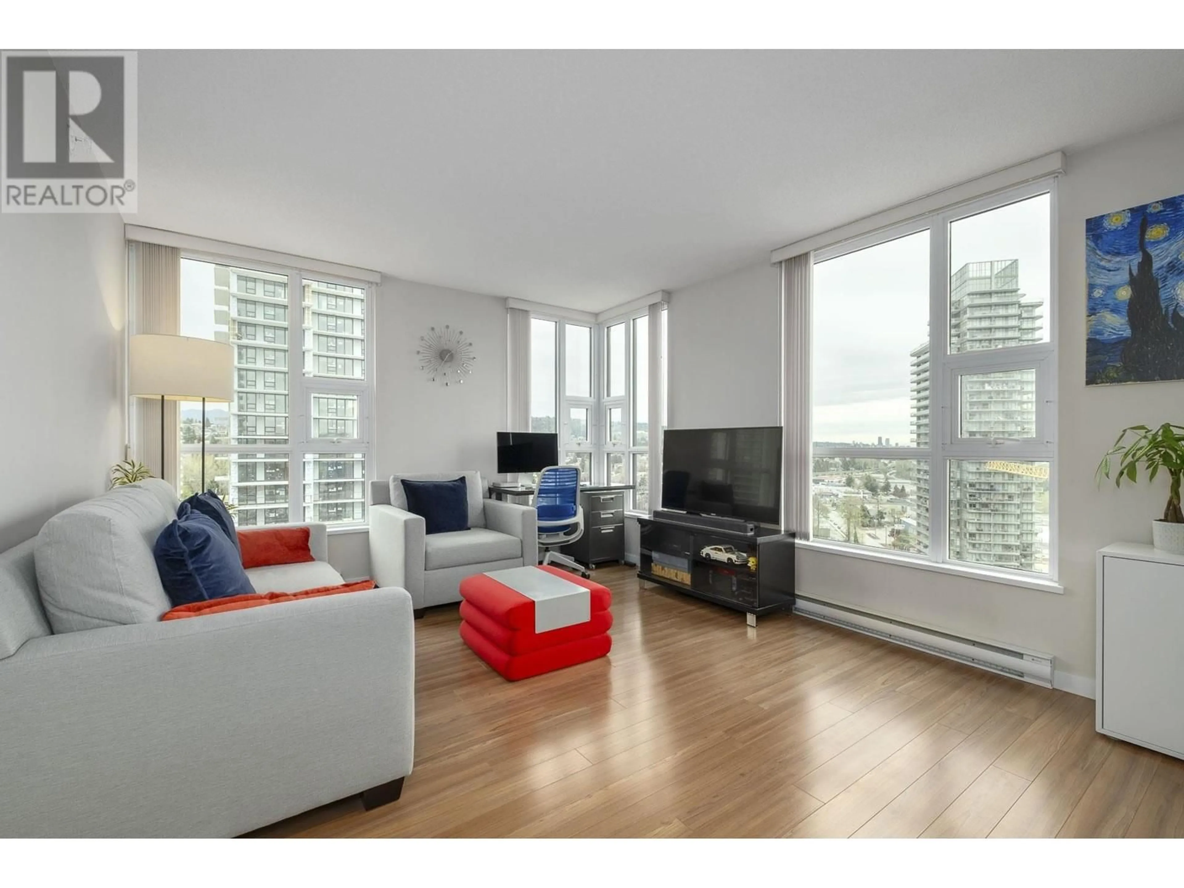Living room with furniture, wood/laminate floor for 1706 - 2232 DOUGLAS ROAD, Burnaby British Columbia V5C5A7