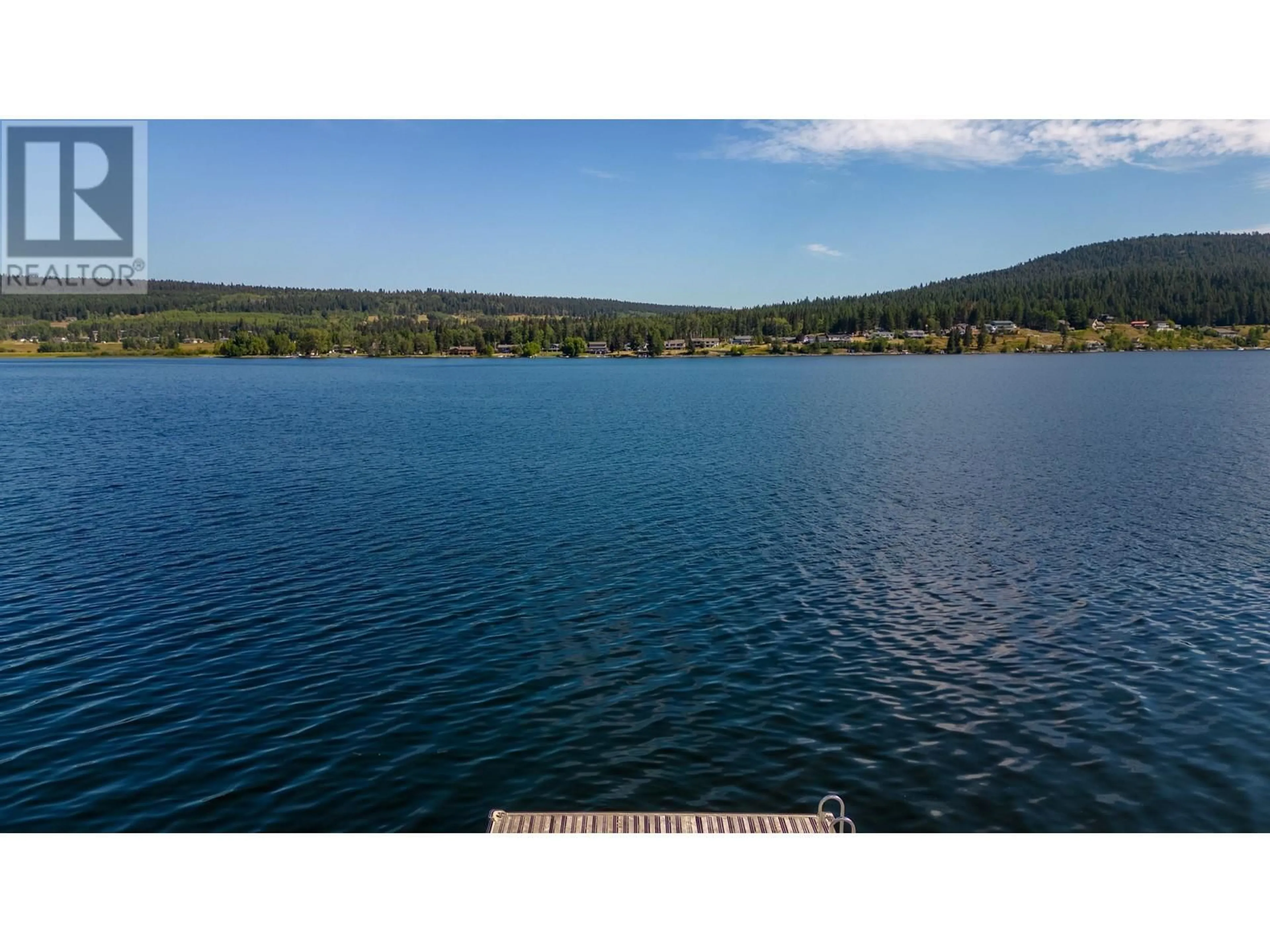A pic from outside/outdoor area/front of a property/back of a property/a pic from drone, water/lake/river/ocean view for 6088 NORMAN ROAD, 100 Mile House British Columbia V0K2E3