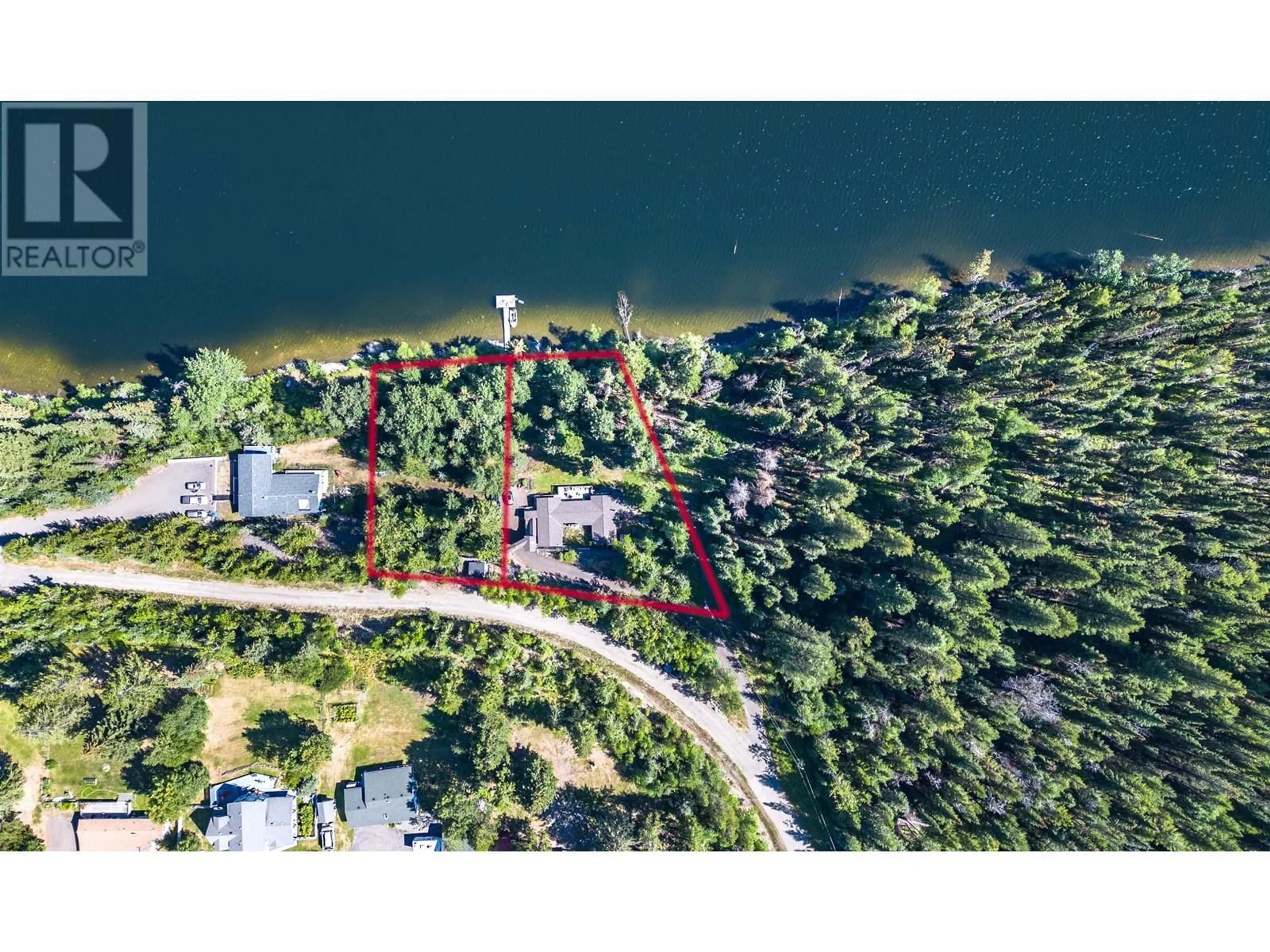 A pic from outside/outdoor area/front of a property/back of a property/a pic from drone, water/lake/river/ocean view for 6088 NORMAN ROAD, 100 Mile House British Columbia V0K2E3