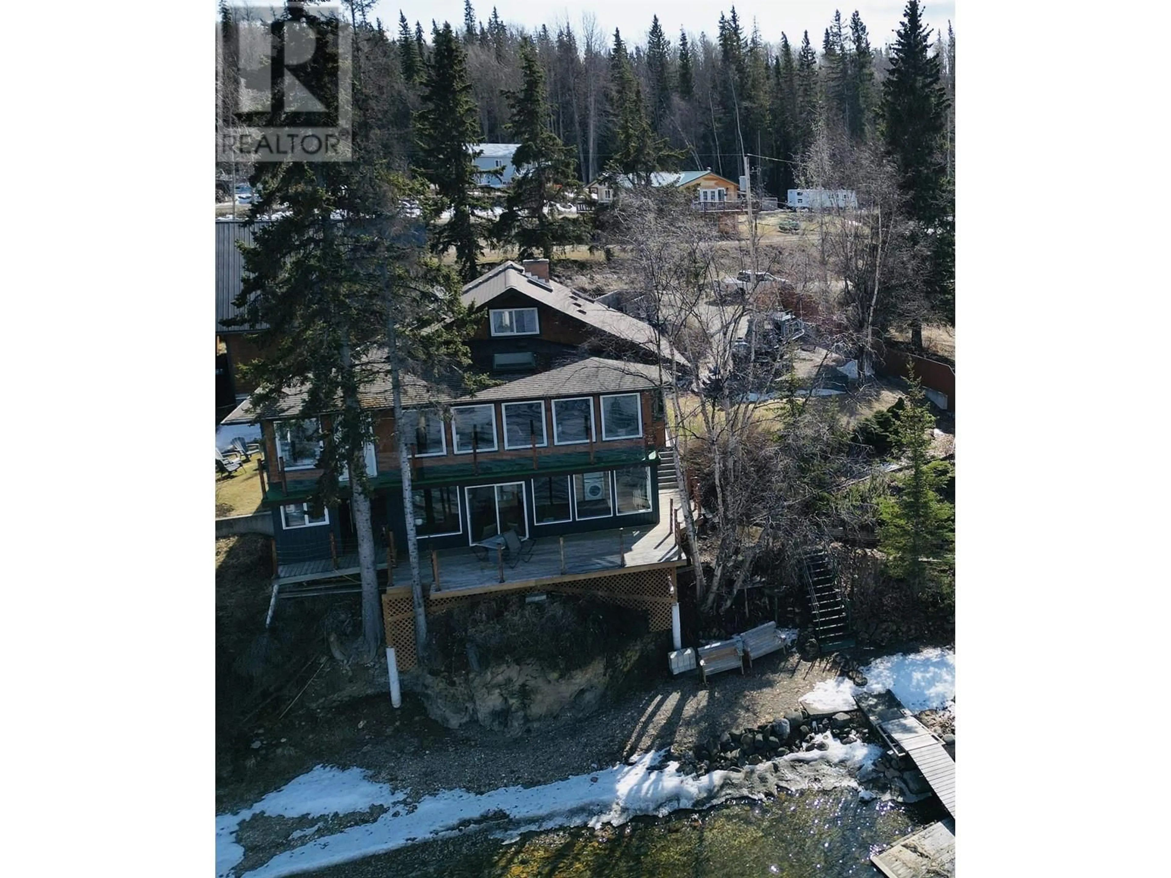 A pic from outside/outdoor area/front of a property/back of a property/a pic from drone, water/lake/river/ocean view for 1638 UNCHA LAKE ROAD, Burns Lake British Columbia V0J2P0