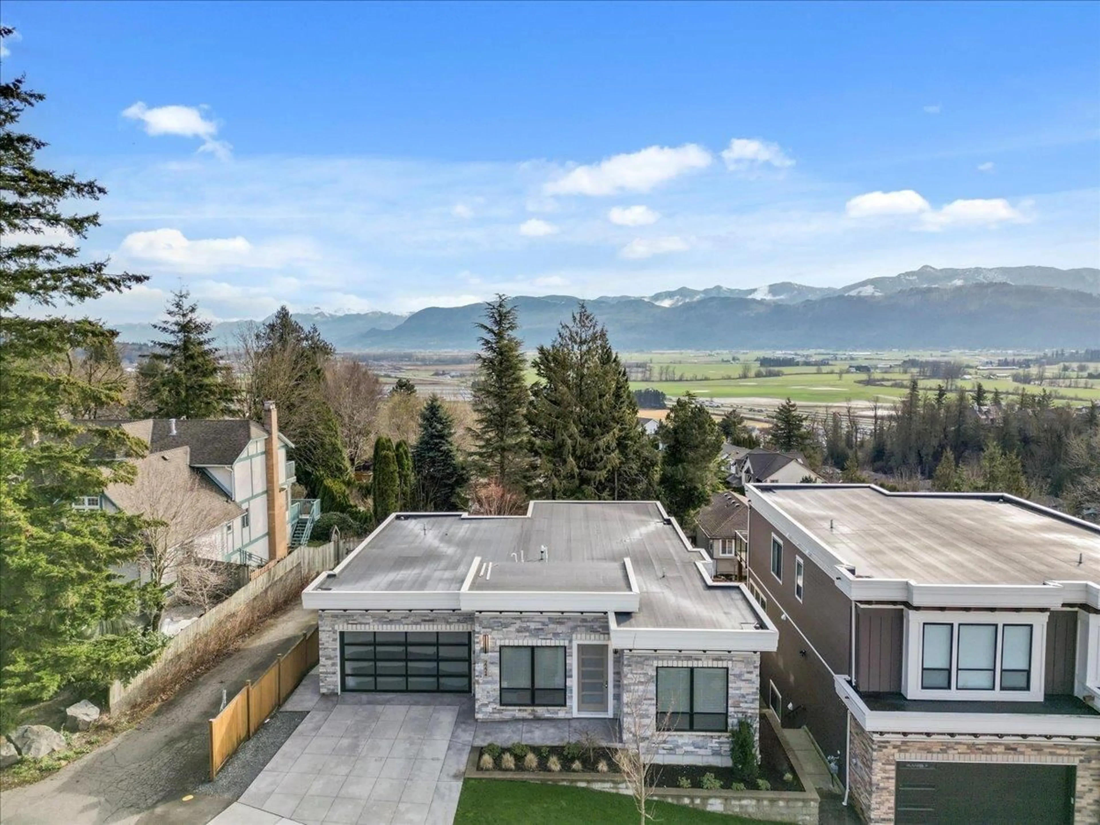 A pic from outside/outdoor area/front of a property/back of a property/a pic from drone, mountain view for 2224 TIMBERLANE, Abbotsford British Columbia V3G0H5