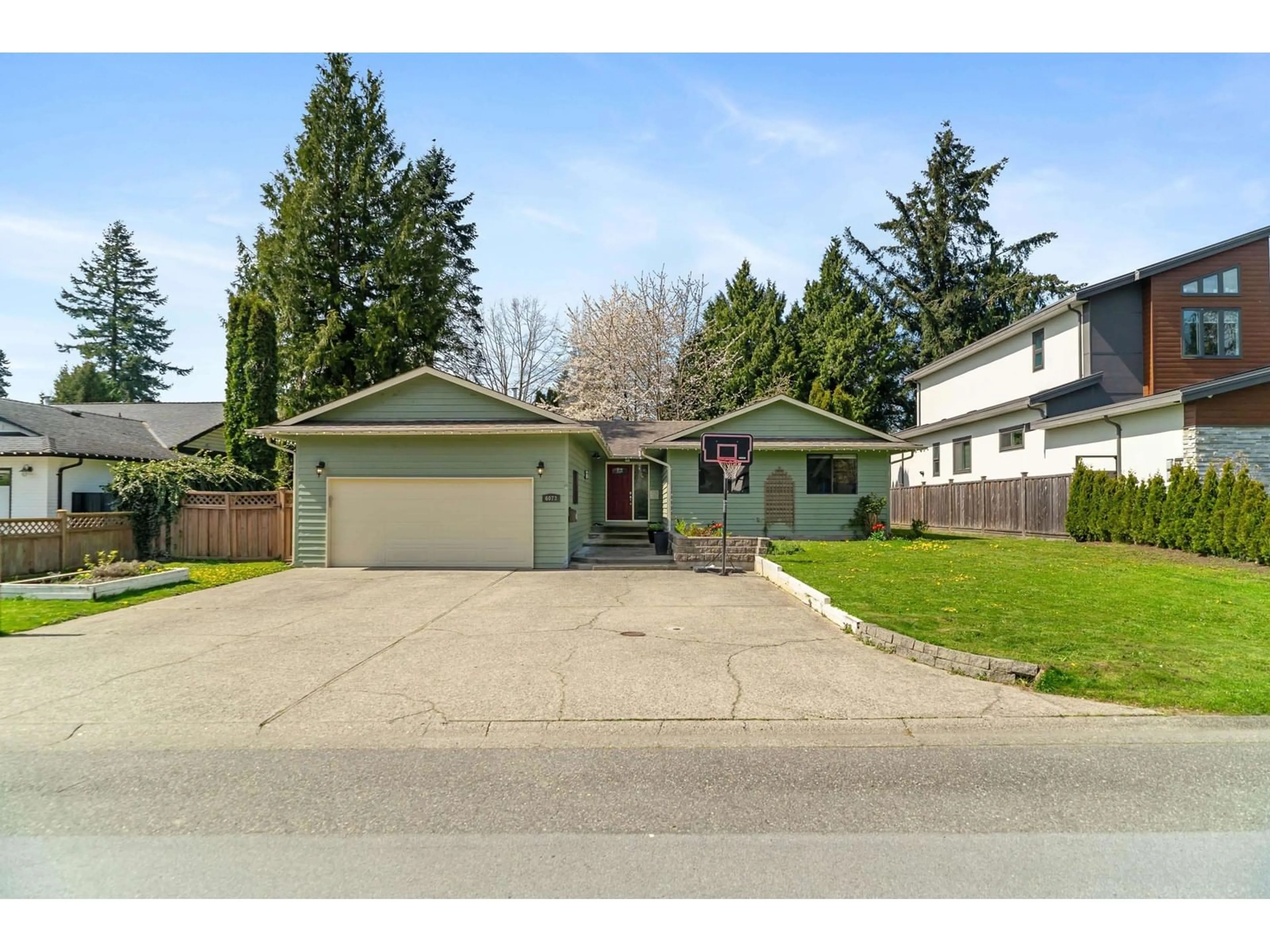 A pic from outside/outdoor area/front of a property/back of a property/a pic from drone, street for 6073 172B, Surrey British Columbia V3S6G6