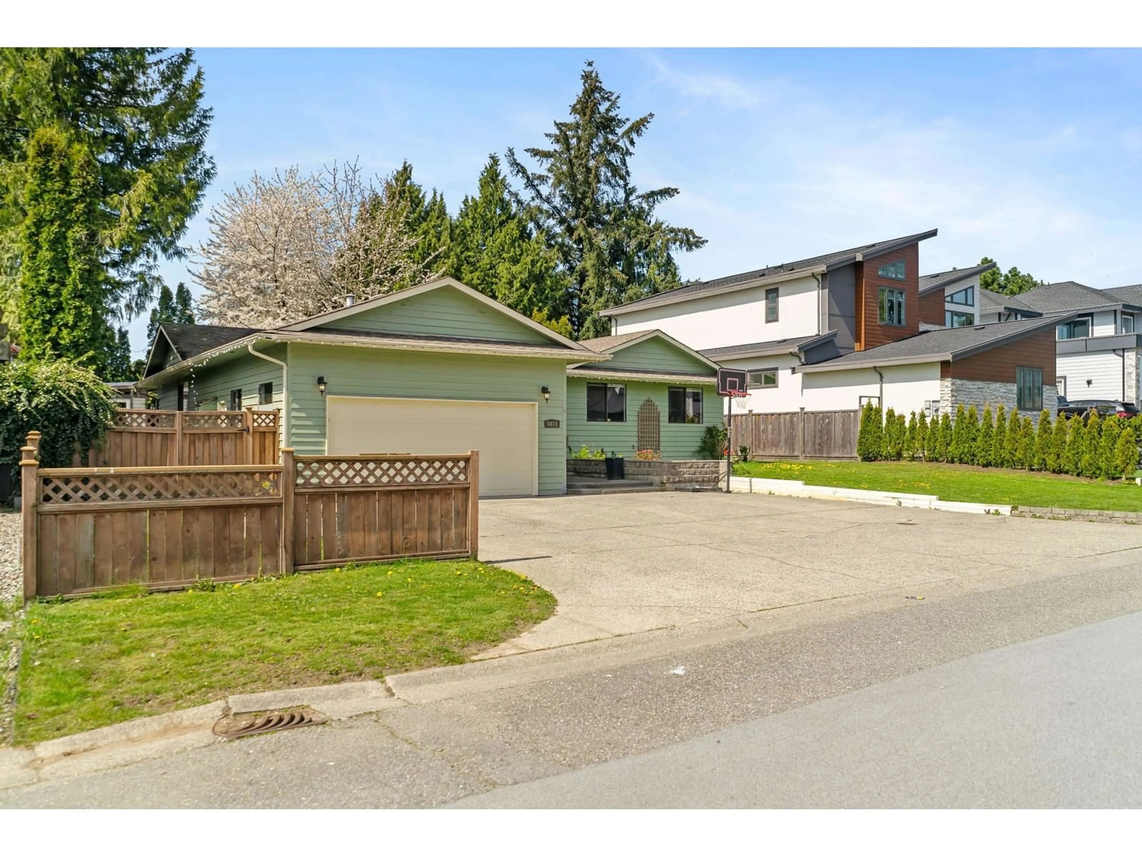 A pic from outside/outdoor area/front of a property/back of a property/a pic from drone, street for 6073 172B, Surrey British Columbia V3S6G6