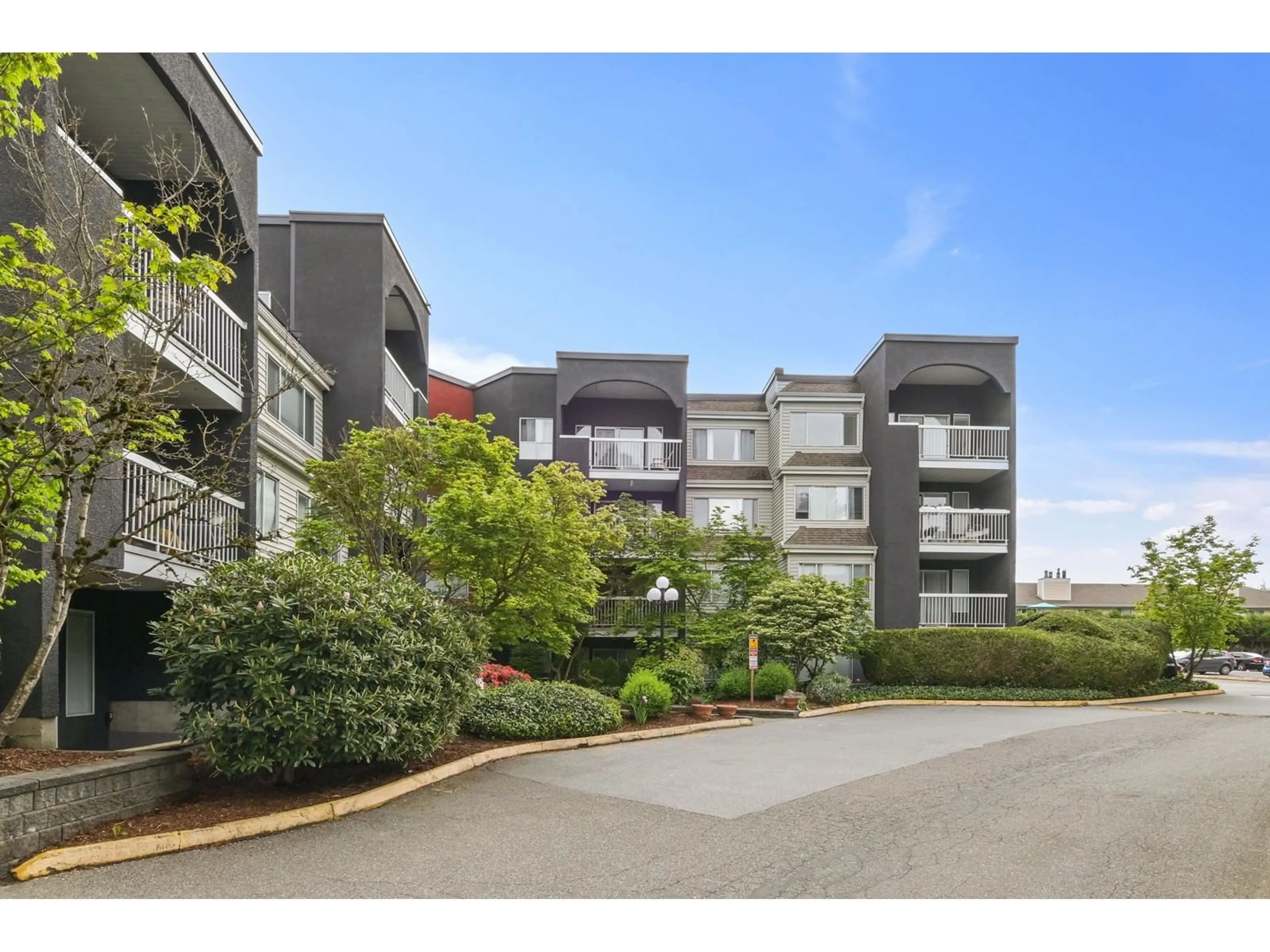 A pic from outside/outdoor area/front of a property/back of a property/a pic from drone, mountain view for 208 - 5700 200, Langley British Columbia V3A7S6