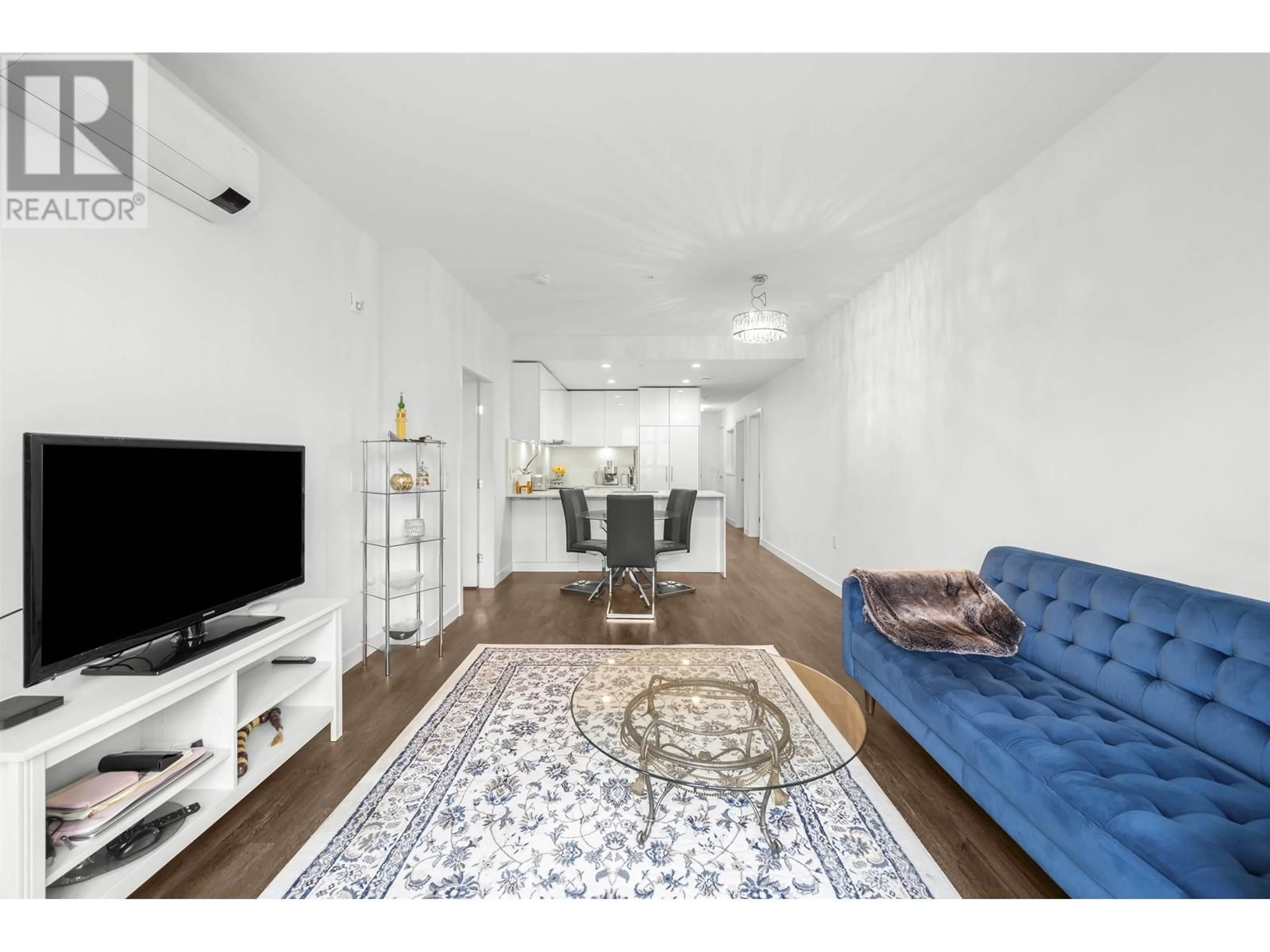 Living room with furniture, unknown for 201 - 2446 SHAUGHNESSY STREET, Port Coquitlam British Columbia V3C3E5