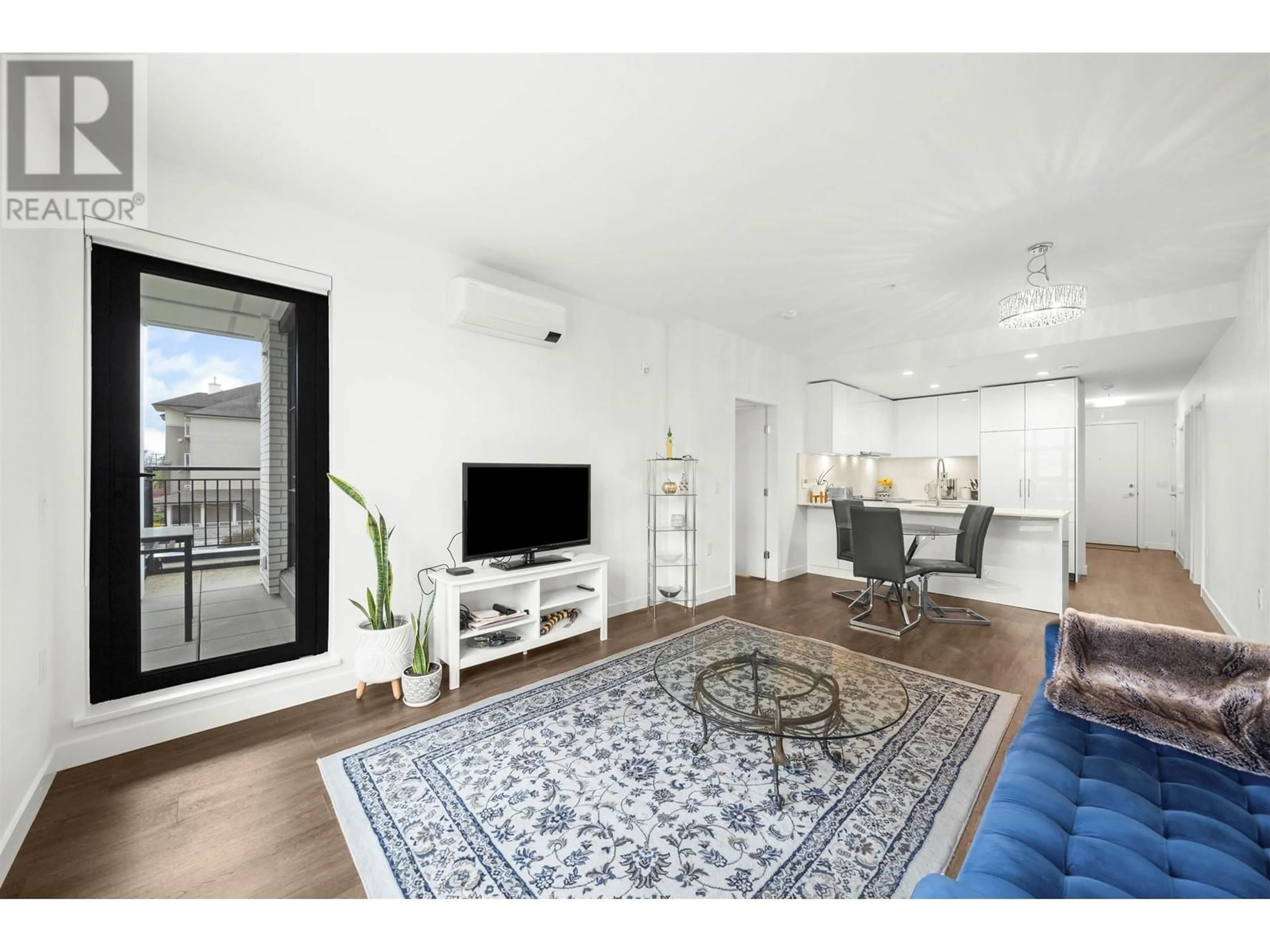 Living room with furniture, unknown for 201 - 2446 SHAUGHNESSY STREET, Port Coquitlam British Columbia V3C3E5