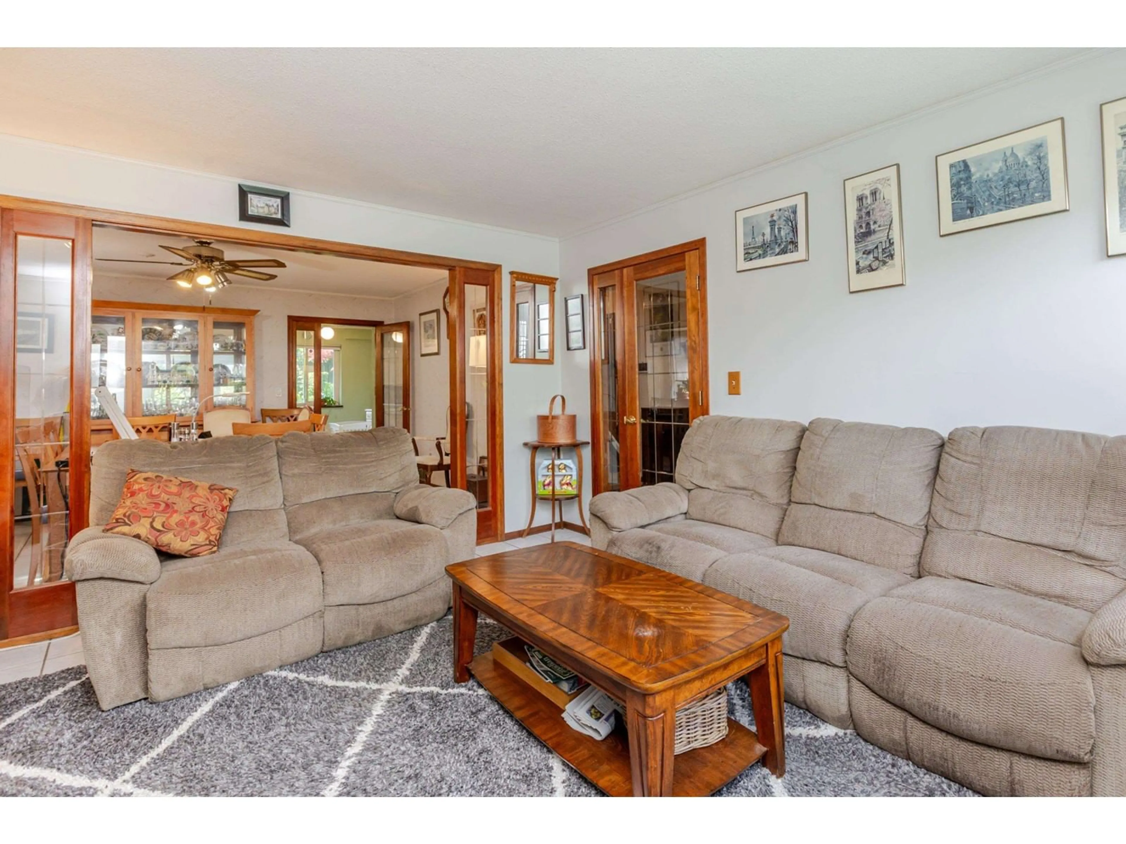 Living room with furniture, wood/laminate floor for 13311 65A, Surrey British Columbia V4W3A3