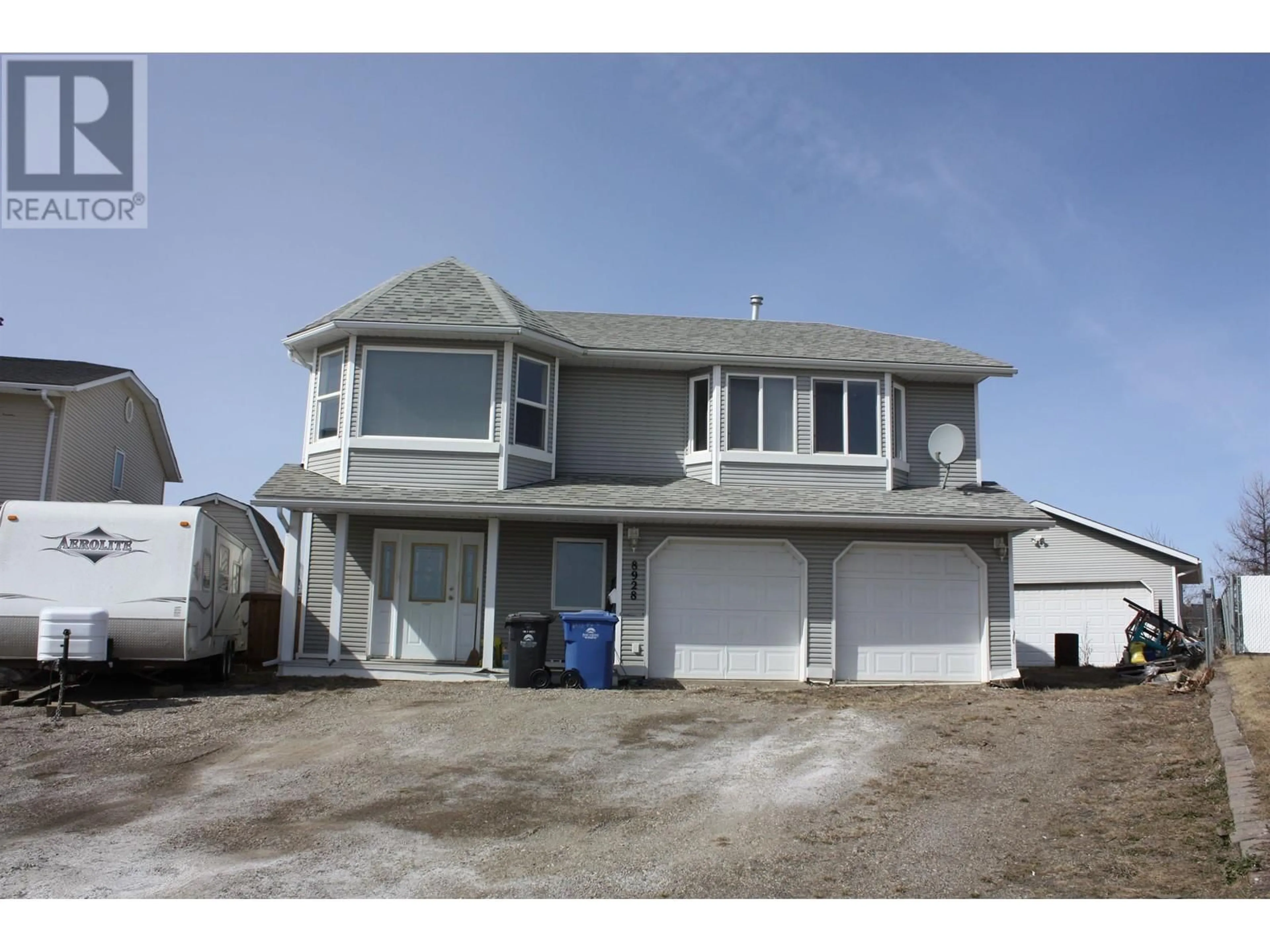 Home with vinyl exterior material, building for 8928 84A STREET, Fort St. John British Columbia V1J6T1