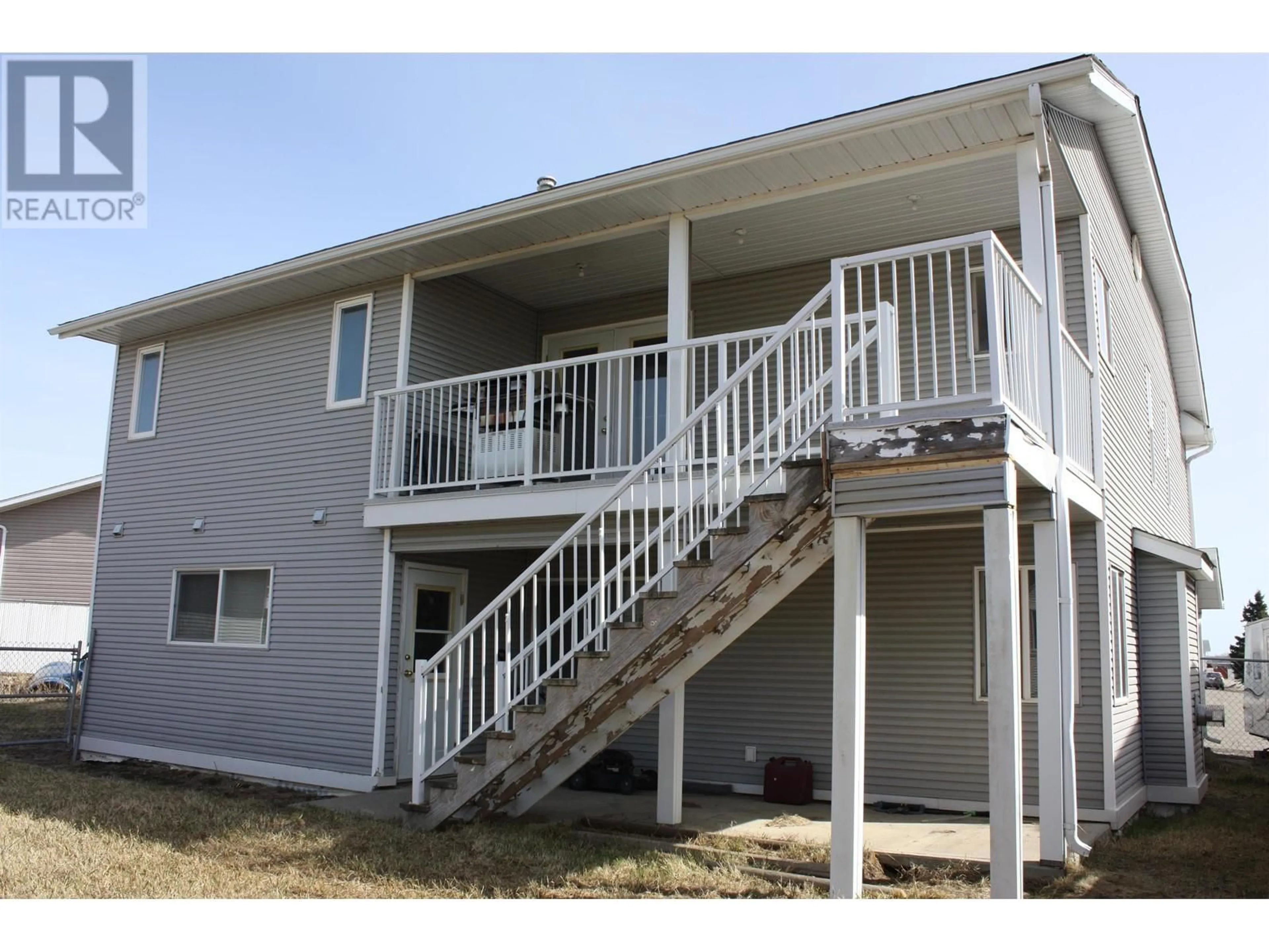 Home with vinyl exterior material, building for 8928 84A STREET, Fort St. John British Columbia V1J6T1