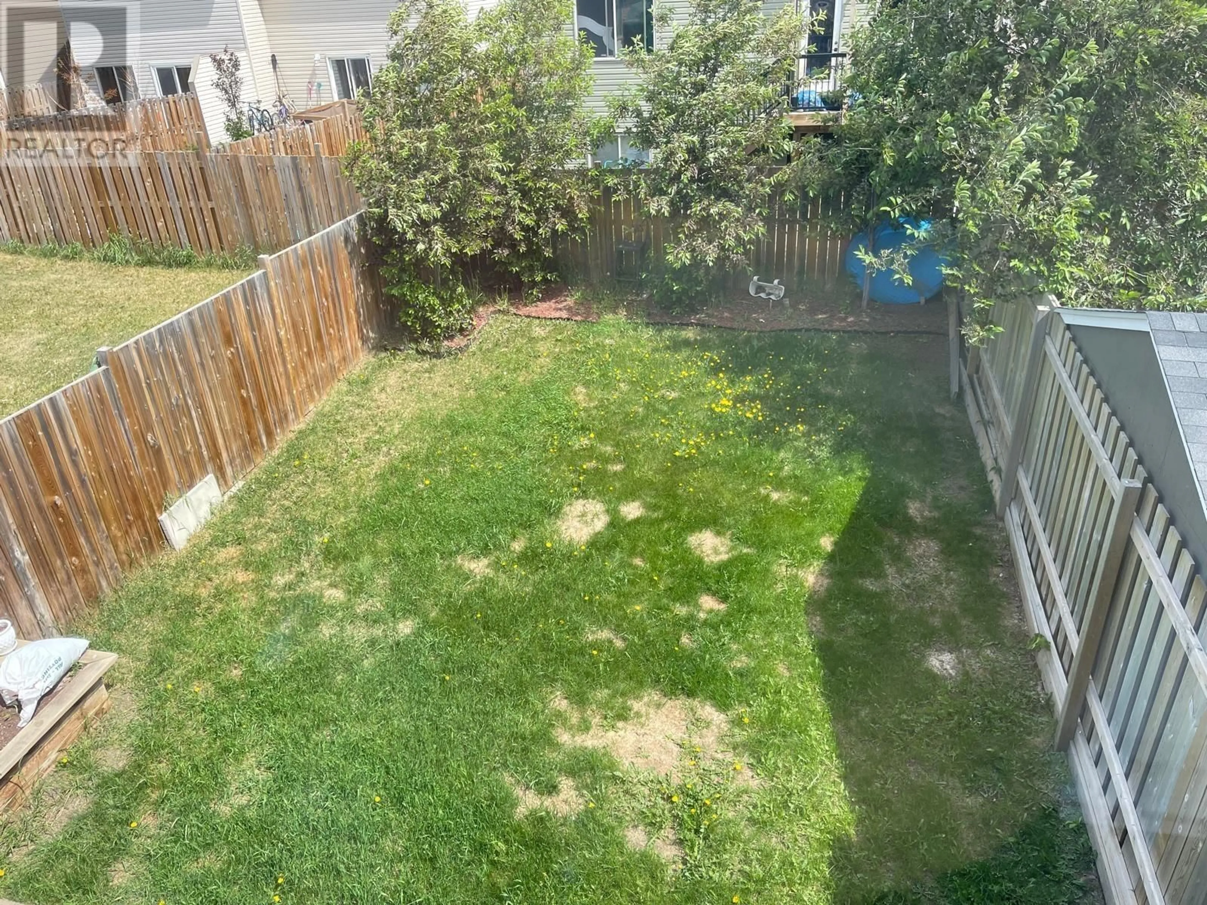 A pic from outside/outdoor area/front of a property/back of a property/a pic from drone, street for 8629 83 STREET, Fort St. John British Columbia V1J0G8