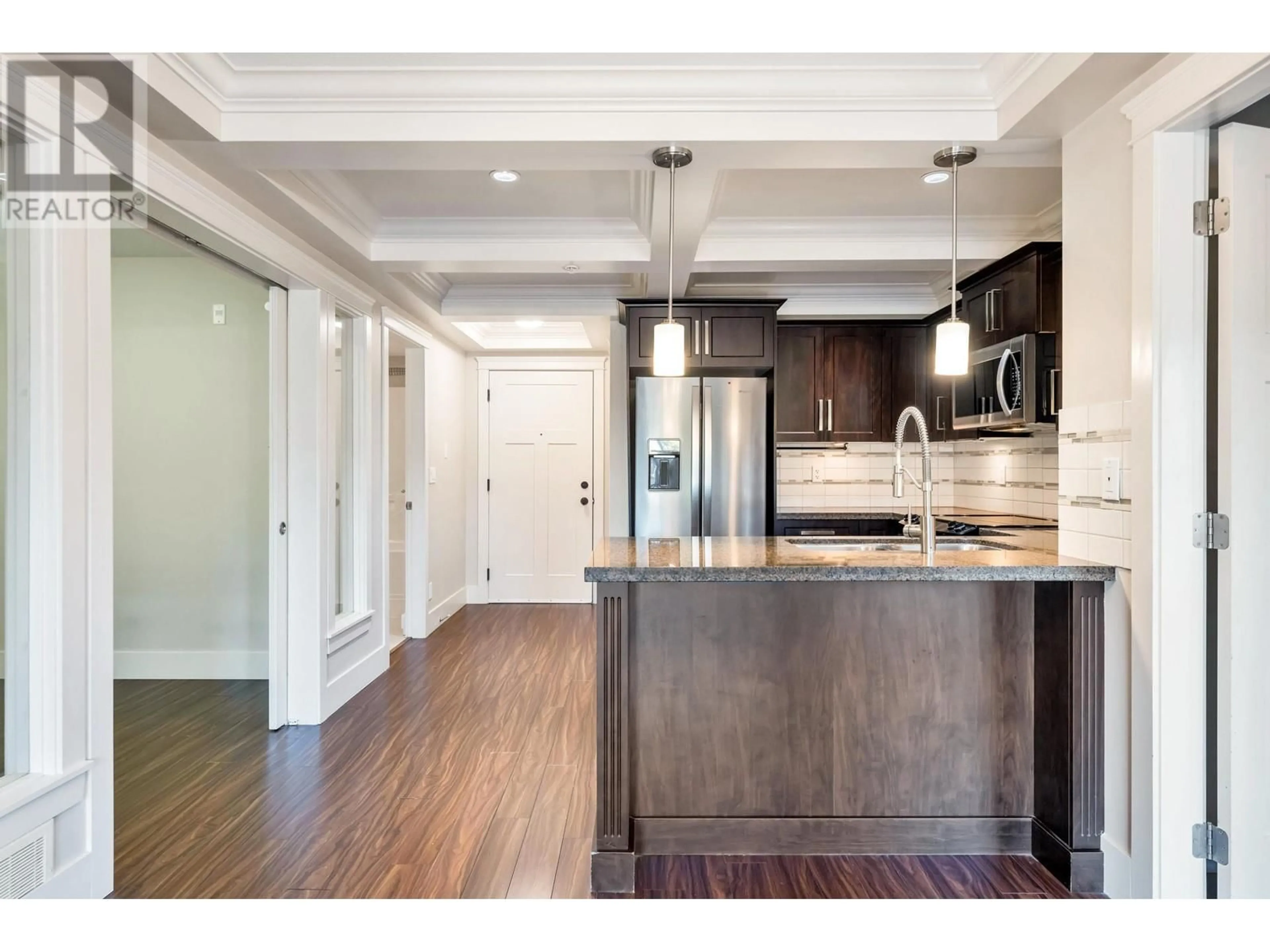Open concept kitchen, wood/laminate floor for 309 - 2175 FRASER AVENUE, Port Coquitlam British Columbia V3B0H8